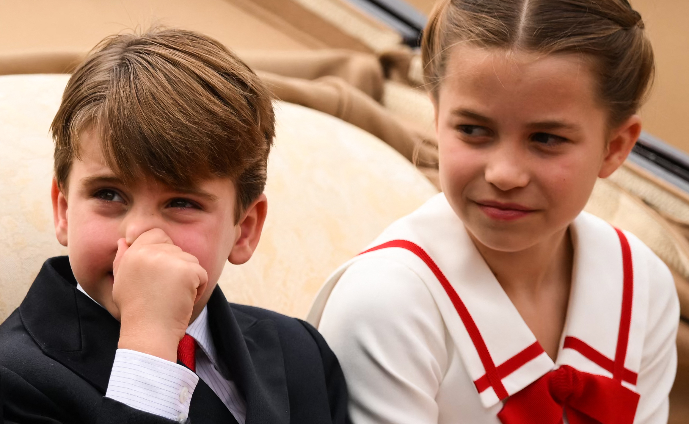 <p><span>Princess Charlotte gave little brother Prince Louis a look as he held his nose while riding in a carriage during </span><a href="https://www.wonderwall.com/celebrity/royals/trooping-the-colour-2023-king-charles-iii-celebrates-the-first-of-his-reign-752078.gallery">Trooping the Colour</a><span> in London on June 17, 2023.</span></p>