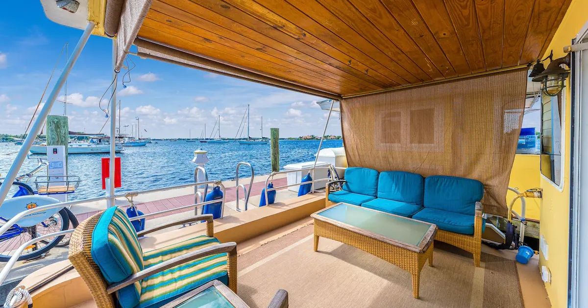 <p> If simply being near the water isn’t enough, try staying on a houseboat in Stuart for $124 per night. The rental includes a sofa bed, kitchen and dining area, bathroom, and rooftop patio. </p> <p> When you’re not enjoying the Sunset Bay Marina, you can take a quick walk to the historic downtown area for food and entertainment or take a short bike ride to the beach. </p>