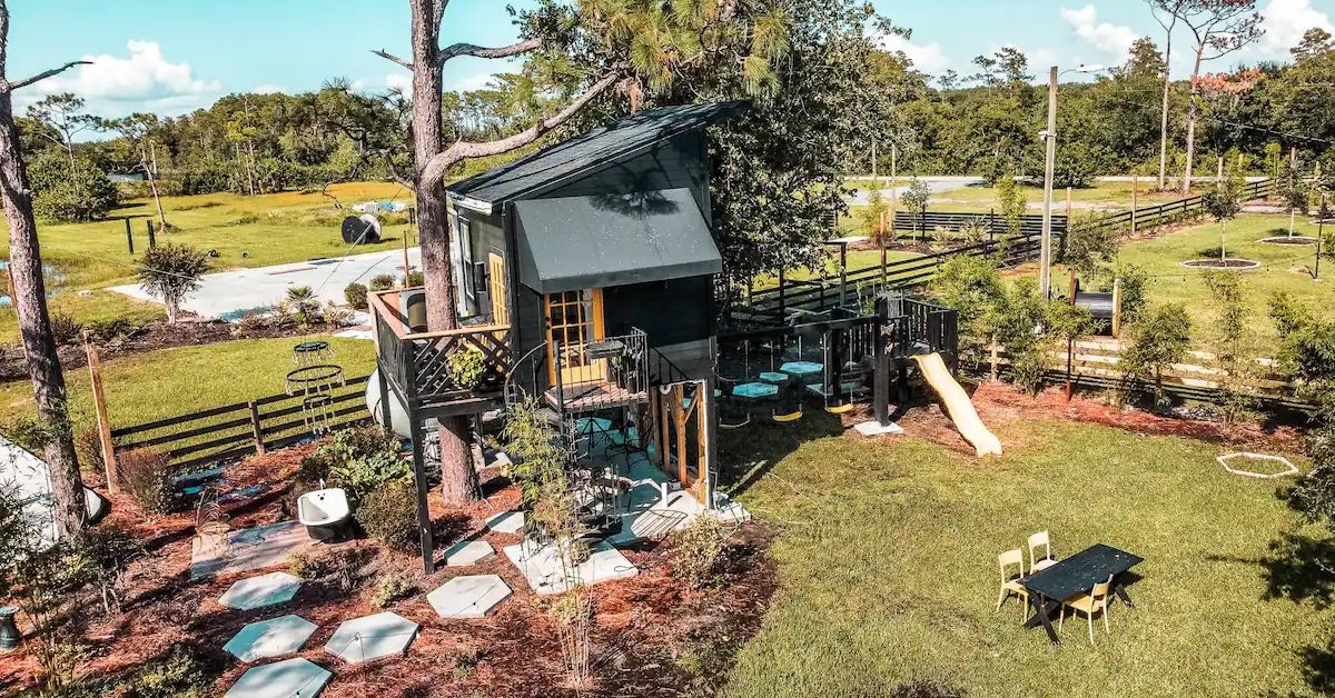 <p> Experience all Orlando has to offer from the comfort and whimsy of a treehouse for $135 per night. Inside, there’s a queen bed, air mattress, and couches to sleep on, plus a fully stocked kitchen.  </p> <p> You can ride a slide out of the treehouse, then enjoy a cozy patio area with a tire swing, dining spot, and an outdoor bathtub. The space can also double as a wedding venue. </p>