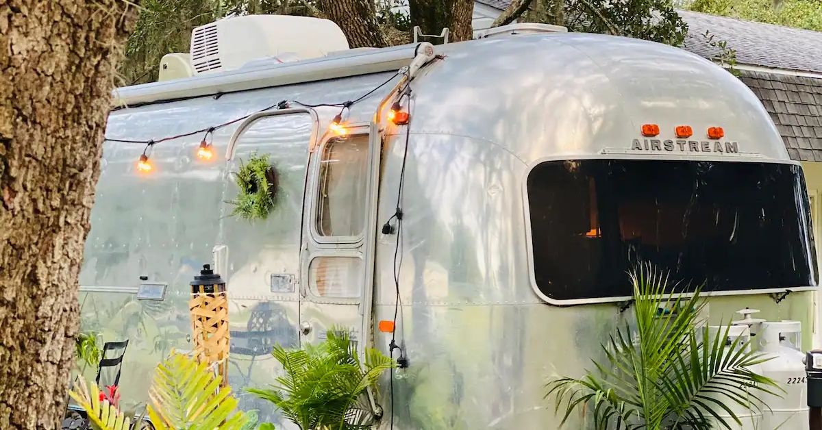 <p> Set in a vintage Airstream in Milton, Luna by the Sea rents for $163 per night. </p><p>The camper has a dreamy and delicate look to it, lit with fairy lights and lanterns. There’s a bed, kitchen, and bathroom, plus a hammock with mosquito netting for an outdoor snooze.  </p> <p> The real draw, though, is the private bay beach access. A kayak and lounge space are provided. And the white Gulf beaches of Navarre and Pensacola are just 20 minutes away. </p>