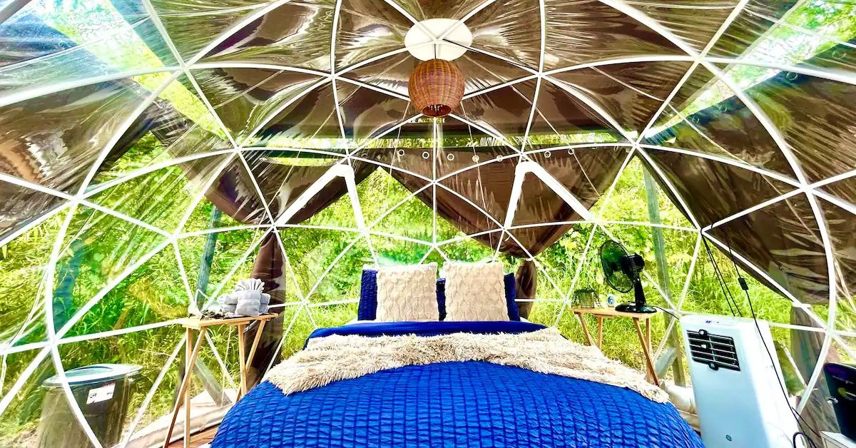 <p> This fun glamping opportunity can be found in Davenport for $128 a night. There are two plastic dome enclosures — one a bedroom and one a living room. There’s also a private bathroom and an outdoor shower. </p> <p> The domes have AC, Wi-Fi, and a television. Outside, there is a grill and fire pit, a hammock, and a hot tub. The property has a gated entry and sits on 10 acres of land.  </p>