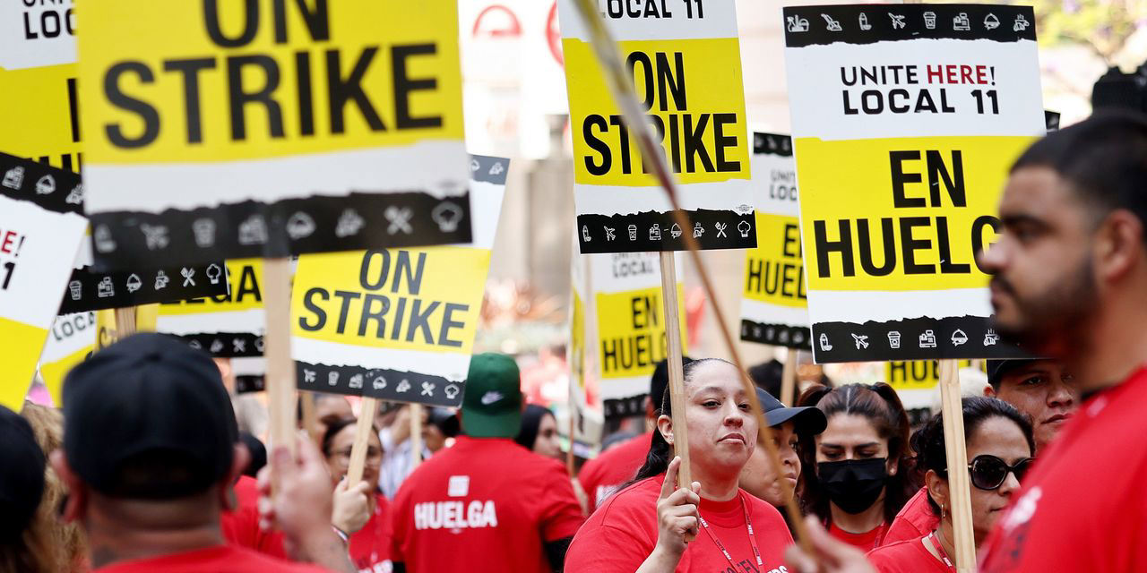 Thousands more Los Angeles hotel workers strike, pushing for wage hikes