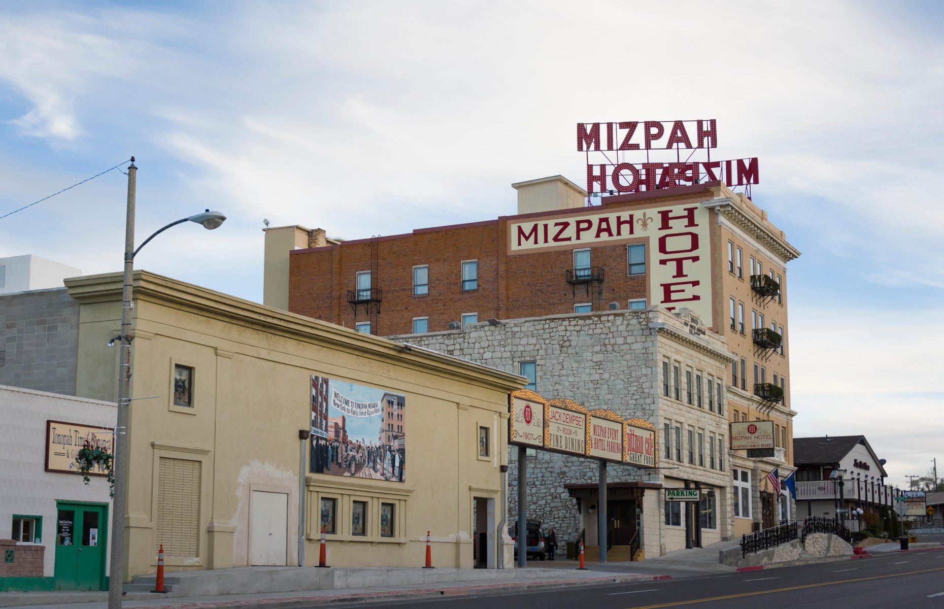 <p>Located in the heart of downtown Tonopah, The Mizpah Hotel was once referred to as “the finest stone hotel in the desert.” Built in 1907 over five storeys, it was the tallest building in the Silver State for 25 years until the Hotel Nevada came along to steal its crown. With over a century of human history, this grand venue has hosted prospectors, politicians, playboys and all manner of VIPs throughout the years. But there is one guest who has stayed longer than most...</p>