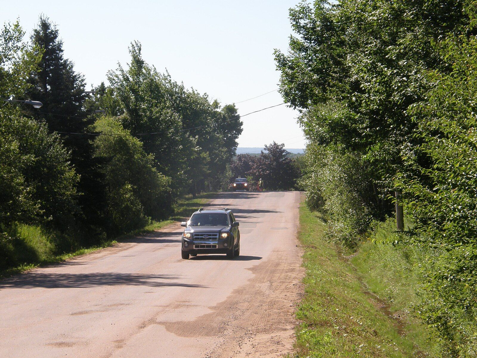 <p>Off the Trans-Canada Highway in New Brunswick, Moncton’s famous <a href="https://www.atlasobscura.com/places/moncton-magnetic-hill">Magnetic Hill</a> has perplexed tourists since the 1930s. On this gravity hill, if you take your foot off the brakes and put your car into neutral, you’ll watch in amazement as the car rolls backward uphill! However, you’ll be the judge if this tourist attraction—or trap—is worth the park admission fee to find out whether there is an actual magnetic field in play here, or whether it’s simply <a href="https://canadiangeographic.ca/articles/rolling-uphill-in-new-brunswick/">an optical illusion</a>. If you’ve come all this way to see the attraction, you might as well stick around to visit the zoo, Magnetic Hill Wharf Village, and the Magic Mountain Water Park. </p>