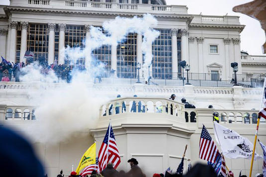 Samuel Corum/Getty The Jan. 6, 2021, riot at the U.S. Capitol, as Donald Trump's supporters attempted to stop the certification of the 2020 election