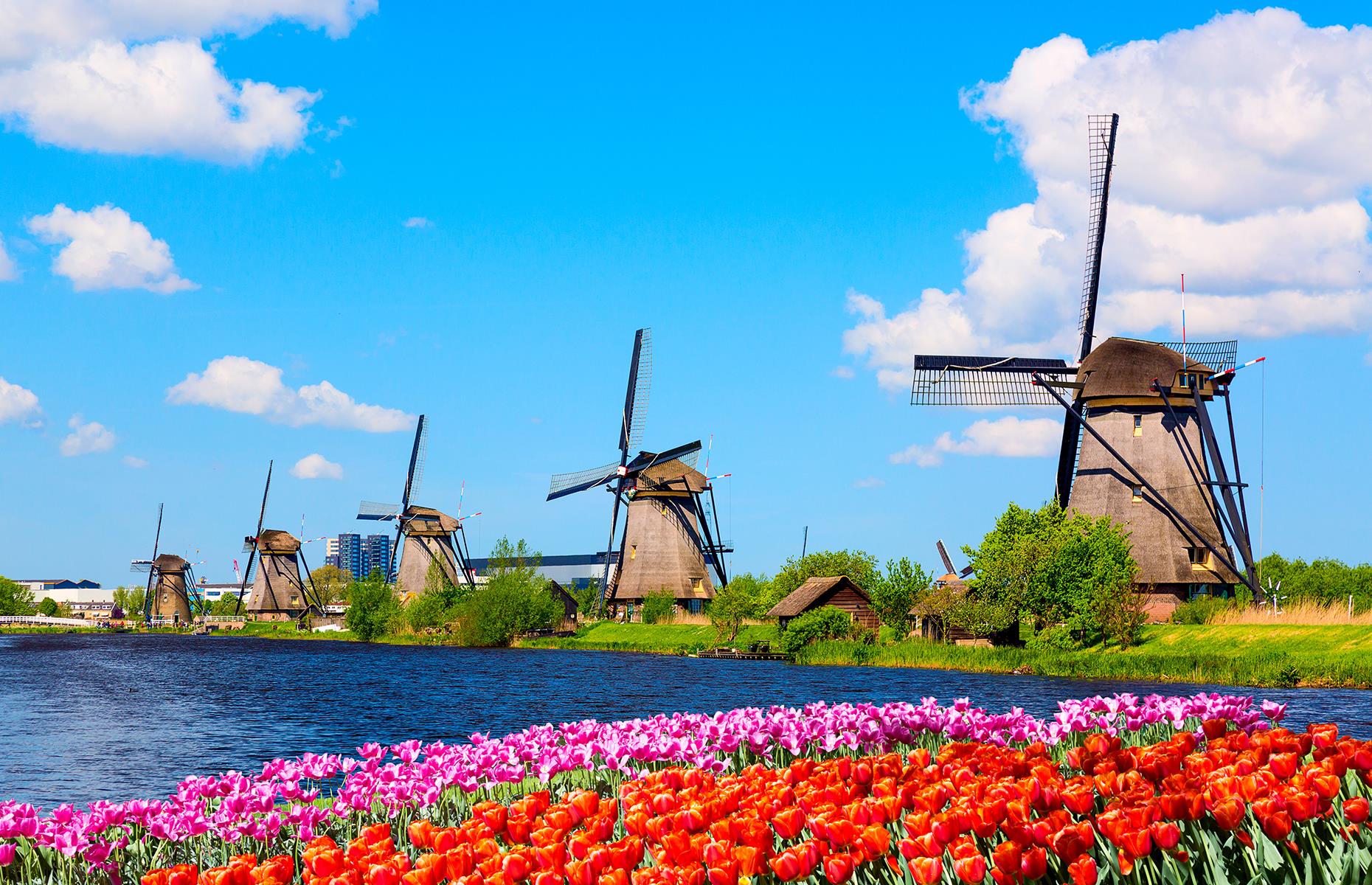 <p>Skip the overcrowded streets and canals of Amsterdam and escape to the country, to Kinderdijk in Netherland's South Holland province. Here, the recognizable Dutch windmills stand tall among the tulip fields and canals. Footpaths and bike trails criss-cross the area peppered with 19 mills – you'll really struggle to find a more Dutch setting than this.</p>  <p><a href="https://www.loveexploring.com/galleries/148920/the-best-nofly-holidays-in-europe?page=1"><strong>These are the best no-fly vacations in Europe</strong></a></p>