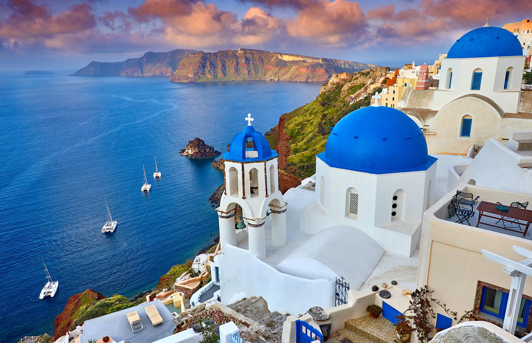 <p>Greece's islands range from built-up party hotspots to traditional places where few tourists venture and everything in between. Ferries from Athens will get you to islands such as Santorini (pictured), with its photogenic hillside houses, or Milos, with its blissful beaches.</p>  <p><a href="https://www.loveexploring.com/galleries/184438/greeces-most-beautiful-small-towns-and-villages?page=1"><strong>These are the most beautiful small towns and villages in Greece</strong></a></p>