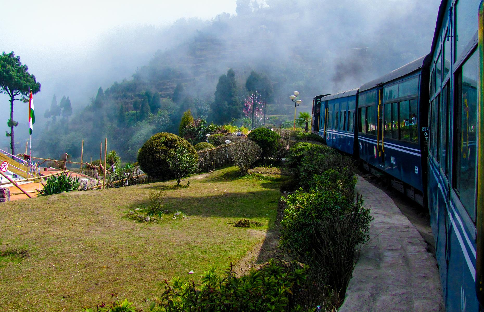 <p>The pretty Indian tea town of Darjeeling is not only worth visiting in its own right, but also for the chance to take a scenic railway journey through the foothills of the Himalayas. While the full route, from New Jalpaiguri, is served by a modern diesel engine, for a more romantic experience try the two-hour Darjeeling-Ghum tourist service, operated by steam train. </p>  <p><a href="https://www.loveexploring.com/galleries/86683/the-worlds-most-scenic-train-journeys-that-dont-cost-a-fortune?page=1"><strong>Take a look at more of the world's most scenic train journeys that don't cost a fortune</strong></a></p>