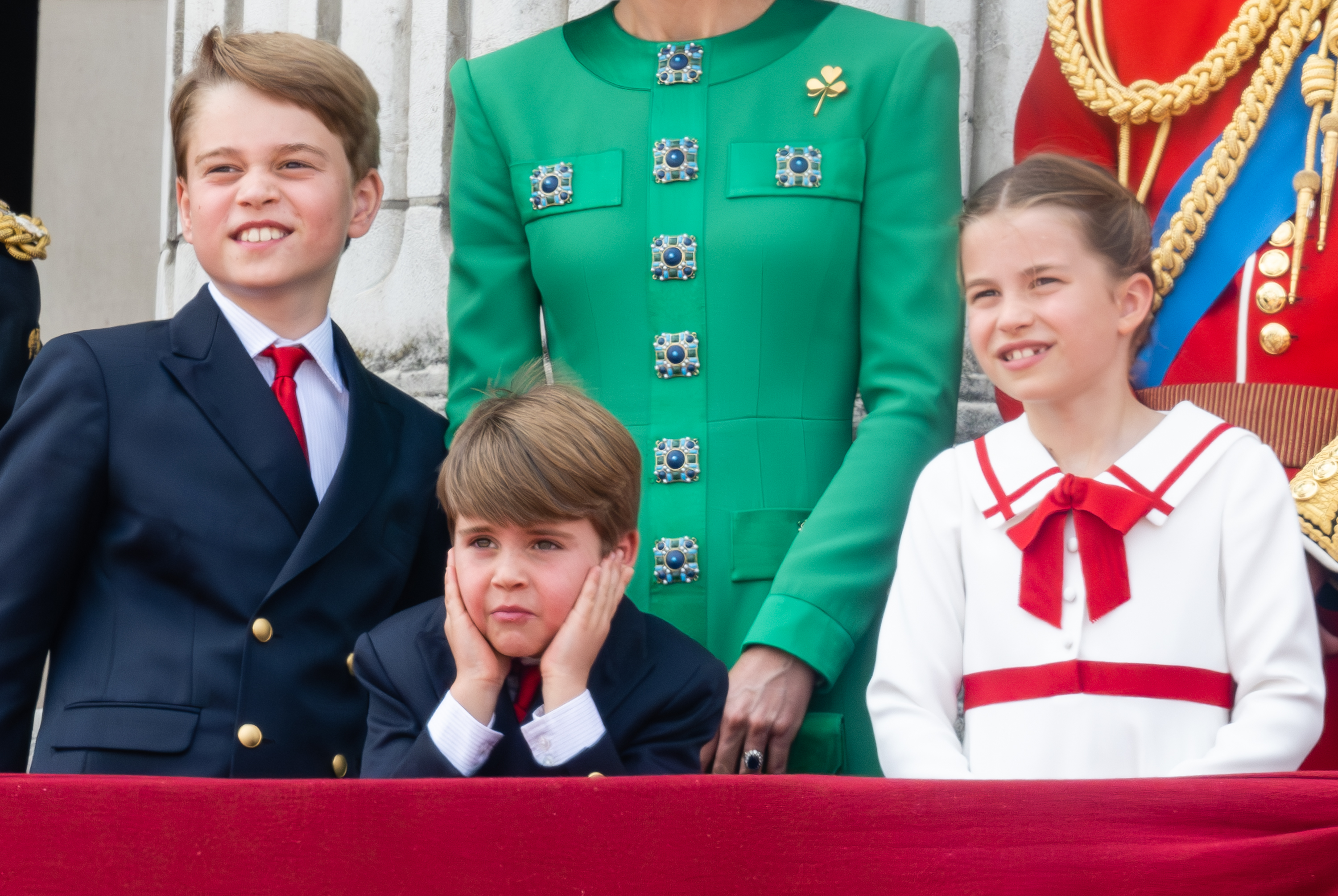 <p>Prince George, Prince Louis -- looking a little bored -- and Princess Charlotte stood on the balcony of Buckingham Palace to watch a Royal Air Force fly-past during <a href="https://www.wonderwall.com/celebrity/royals/trooping-the-colour-2023-king-charles-iii-celebrates-the-first-of-his-reign-752078.gallery">Trooping the Colour</a> in London on June 17, 2023. </p>