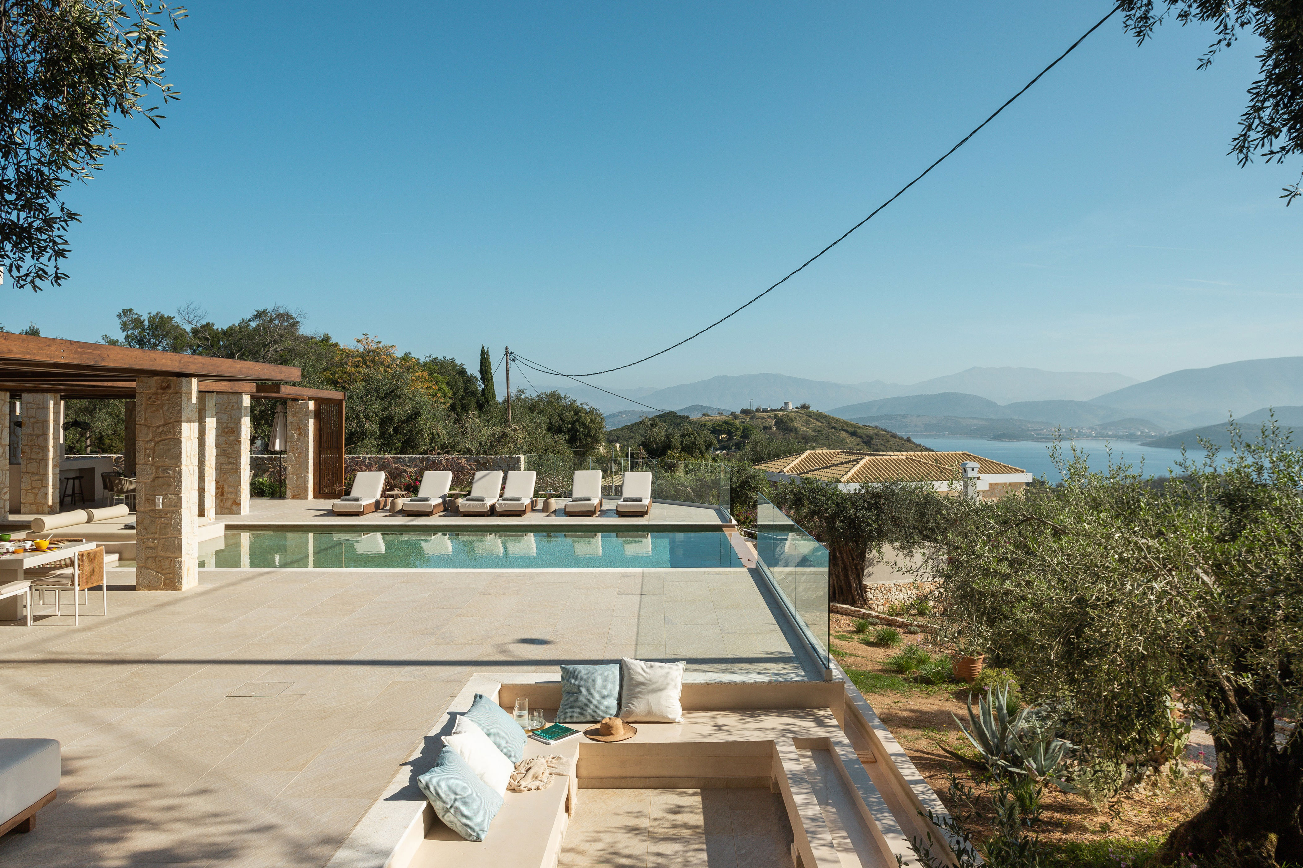 <p><strong>San Stefano, Corfu</strong></p> <p>In the quiet hillside of North East Corfu’s undiscovered San Stefano region, Villa Ines is surrounded by olive trees and overlooks the Ionian Sea. With five modern bedrooms, seven bathrooms, an infinity pool, and an outhouse, this is the ultimate place to unwind with an intimate group of family or friends. You never have to worry about cooking or cleaning—the villa has a chef on hand to prepare breakfast and cook lunch or supper from an impressive menu designed for you. Those keen to stay active should rent a car to explore the nearby villages and hiking trails with undiscovered harbors and coves aplenty. A short and windy drive down the mountain lands you in a charming fishing village, where cafes boast fresh seafood and homemade delicacies while the waves lap at your feet. —<em>Jessica Rach</em></p> <p><strong>Sleeps:</strong> 12<br> <strong>Price:</strong> From $9,822 per week including a private chef and cleaning service</p> <div class="callout"><p><a href="https://cna.st/affiliate-link/3WVdWb4brEJ3fEJXh8qELfUfHFi5HsaJLg86J4i3Jxusfg2jCNA4KH6K2teiPBpeVE1Uds9gpEsCUtNbPw18aaEKqYBEYoJkNgW6GhLfYCvdTBSD7GFikr5FYNbxu3F9SHHkzbdAqyx54YDmRBWxdqKD8URczAy3KLGKrUrX5iiXdQ9qFgoTBN" rel="sponsored" title="Book now at The Greek Villas">Book now at The Greek Villas</a></p> <p><a href="https://cna.st/affiliate-link/X7niGYieCH8TjTwuQSvVA1DaJnuBUMuhrAj3Dd9yT3zd7cenf3RYGB1dpNjPcTWrrwt7W44scyMja3PL1EAXBpK9B9BW2MbiyHB7FAfBUcCEGWWG9n3gzym2S3CmwQceT6eY7V3KHEFvGYi4xiFqqCRdmSoGaRyLbZwHi" rel="sponsored" title="Book now at Edge Retreats">Book now at Edge Retreats</a></p> </div><p>Sign up to receive the latest news, expert tips, and inspiration on all things travel.</p><a href="https://www.cntraveler.com/newsletter/the-daily?sourceCode=msnsend">Inspire Me</a>