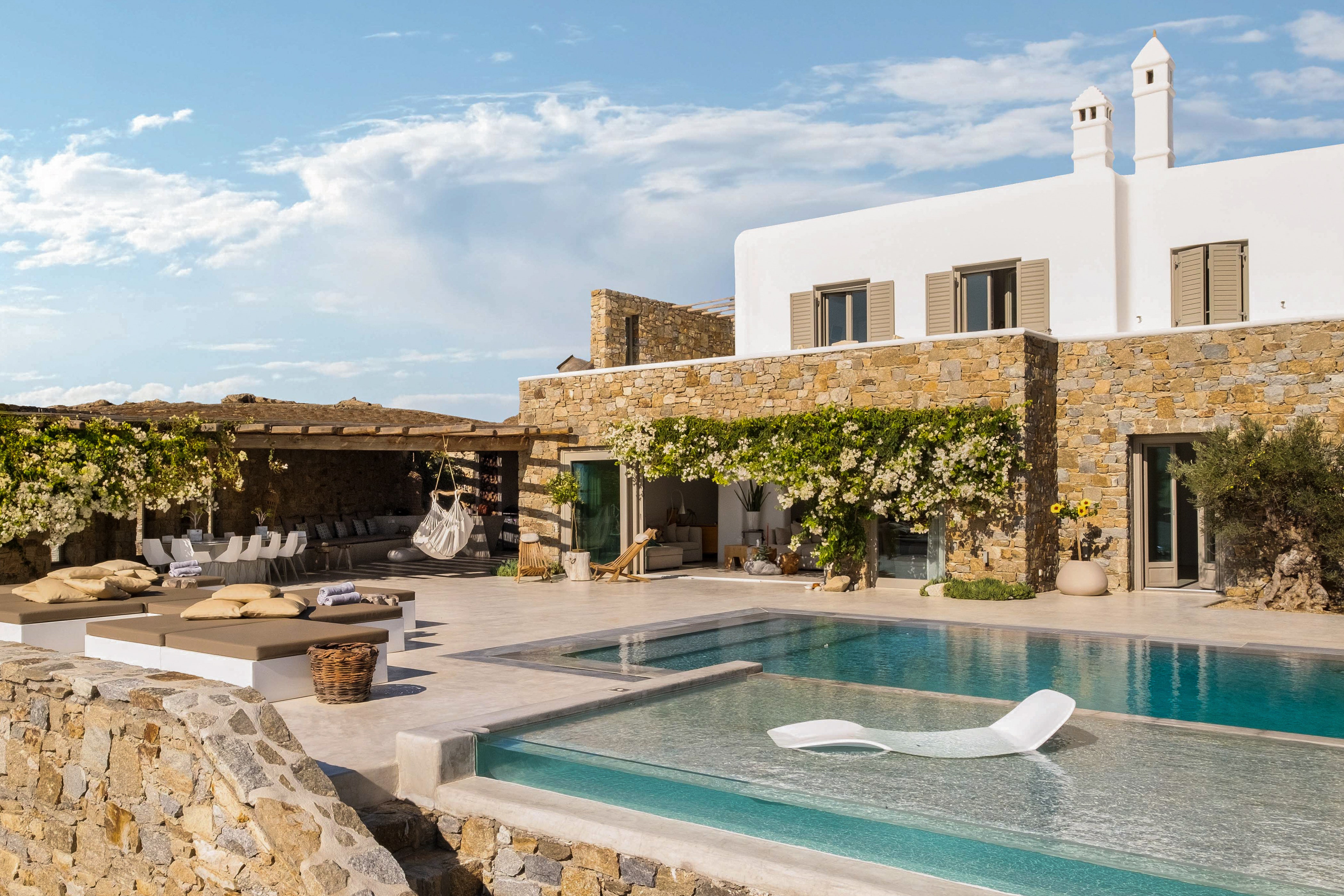 <p><strong>Mykonos</strong></p> <p>Climb up a hillside in Mykonos and land at Villa Fleur—a beautifully designed, six-bedroom stone house. Minimal interiors, natural elements, and white linens give the inside space a fresh, zen-like feel. Outside is where much of the holiday happens with a spacious al fresco dining area seating 12, plus outdoor living space, a rooftop terrace, garden, and a heated infinity pool. Housekeeping and airport transfers are included in your stay with the option to hire a private chef available.</p> <p><strong>Sleeps:</strong> 12<br> <strong>Price:</strong> From $4,350 a night</p> <div class="callout"><p><a href="https://cna.st/affiliate-link/7EaqjGTiGVEZLzw7dtDbaNV19tv3GB292XQUmXXjBeZmXJw4YG2Bg8vEz9PqTk1F9gHnoRHEb7CCs1QWQeQmYFuB1zhVT1QmTRGFYqyv8aAeti45wvAURVSEydCfP2trWxsmT4r7MBbR6osLvBgfA" rel="sponsored" title="Book now at Airbnb">Book now at Airbnb</a></p> </div><p>Sign up to receive the latest news, expert tips, and inspiration on all things travel.</p><a href="https://www.cntraveler.com/newsletter/the-daily?sourceCode=msnsend">Inspire Me</a>