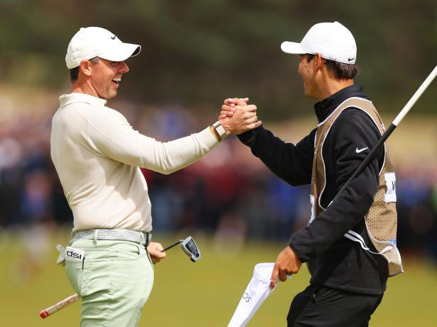 NORTH BERWICK, SCOTLAND - JULY 16: Rory McIlroy of Northern Ireland celebrates with his caddie Harry Diamond after putting in to win the tournament on the 18th green during Day Four of the Genesis Scottish Open at The Renaissance Club on July 16, 2023 in United Kingdom. (Photo by Andrew Redington/Getty Images)