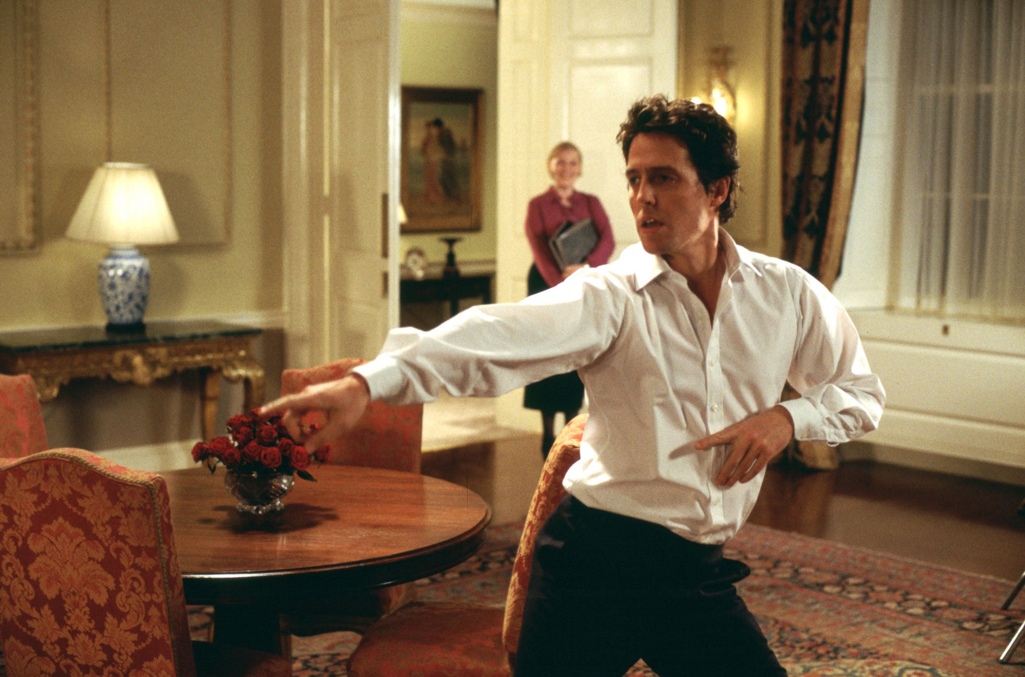 Hugh Grant dances as a fictional PM in ‘Love Actually’ (Universal/Dna/Working Title/Kobal/Shutterstock)