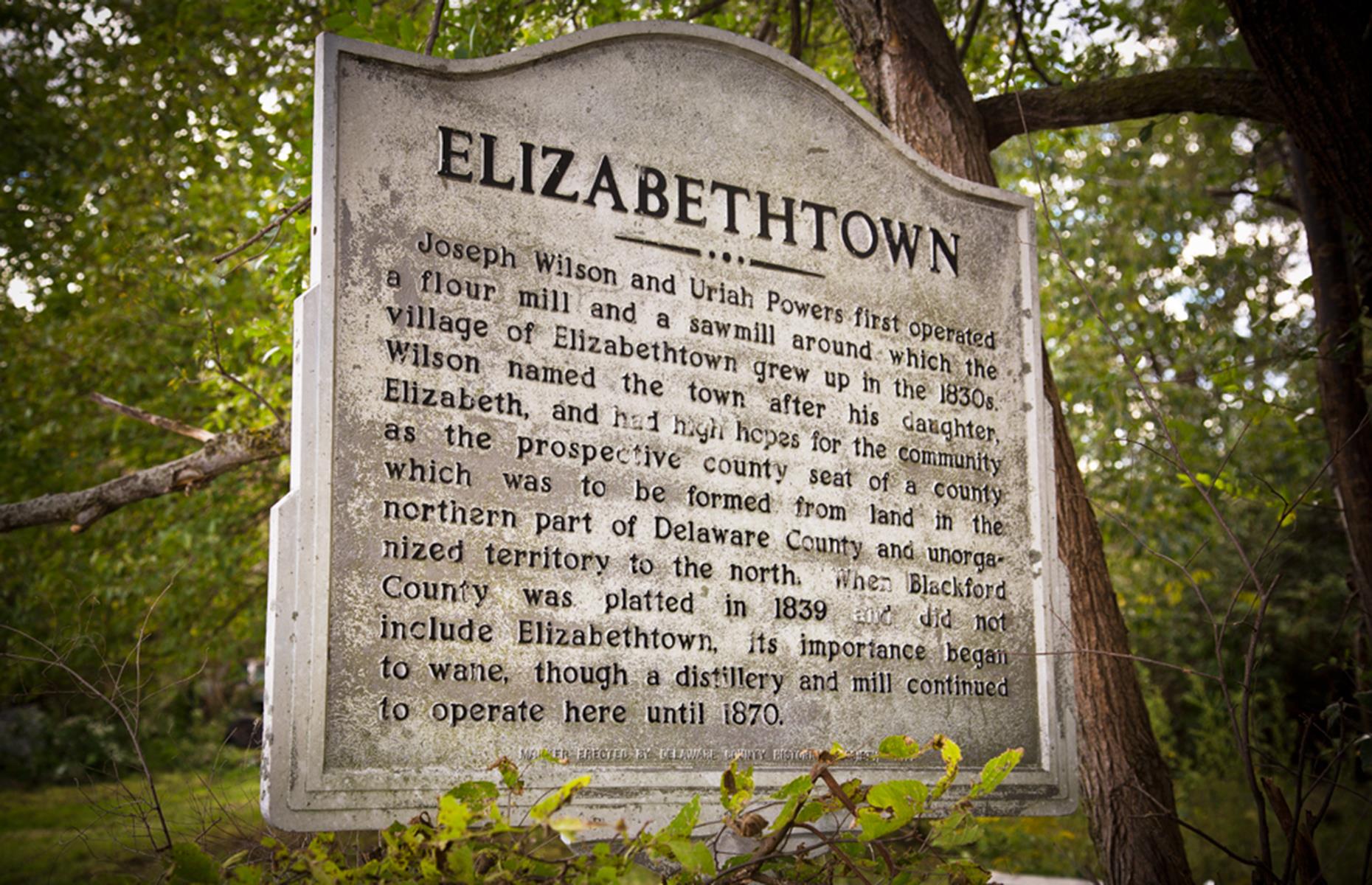 Just over 40 ghost towns are spread out across the Hoosier State, from reservoir-flooded Elkinsville to former railroad towns like Corwin. Among the most historically significant is Elizabethtown, which developed around a flour mill and a sawmill in the 1830s. However, the town's importance dwindled throughout the 19th century. Though industry continued until the 1870s, it was ultimately abandoned. Today all that remains is a weathered historical marker and a cemetery.