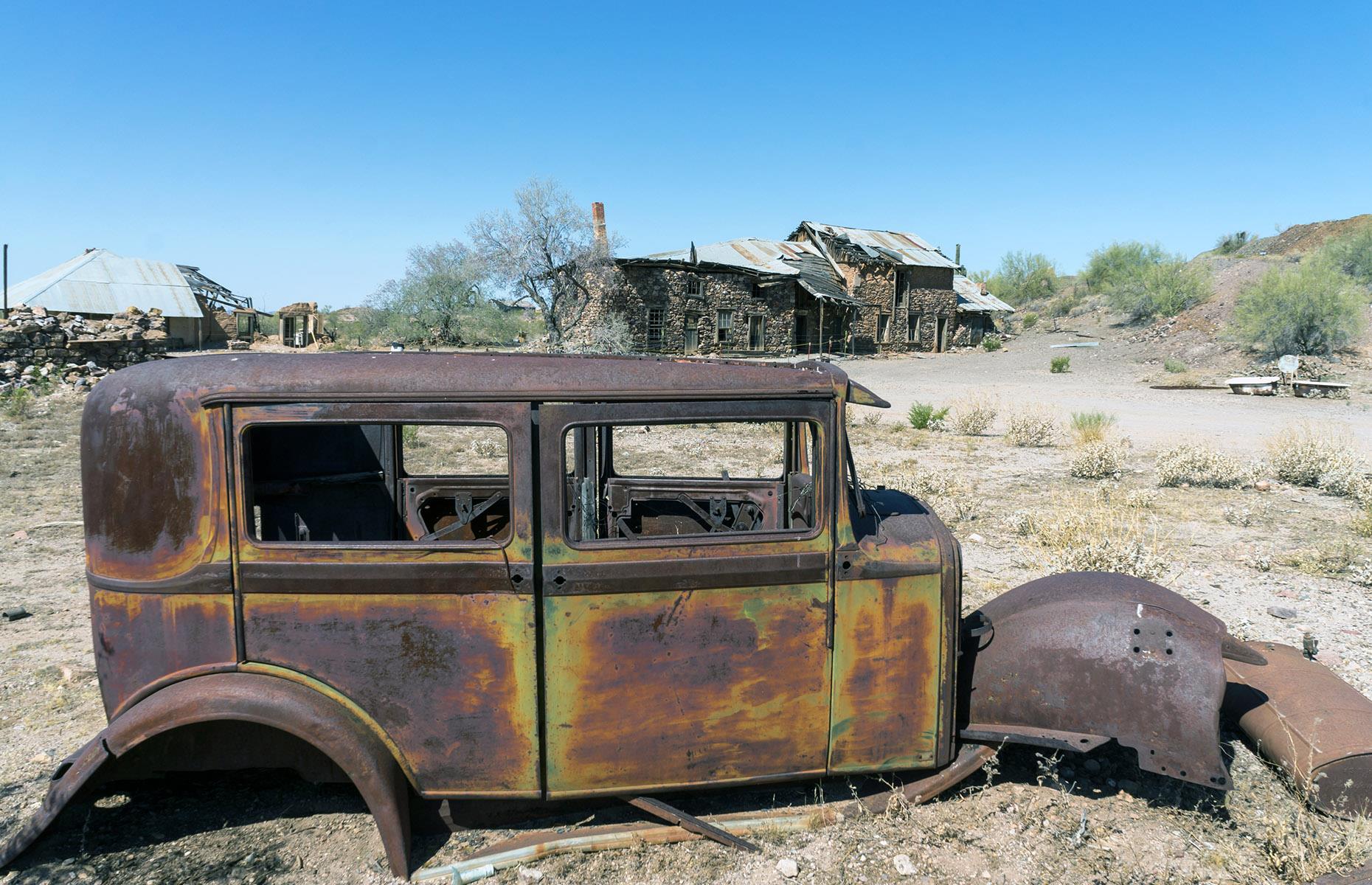 <p>Rusted out cars, creaking mining buildings and long-left-isolated cabins can be found across the length and breadth of Arizona. A fine example is Vulture City, which grew up as a gold-mining camp in the 1860s. Around 5,000 people lived in the town at its peak, but an emergency measure that closed all non-essential mines during the Second World War sounded the death knell for the town. Now the site is remarkably well-preserved and you can discover restored buildings including a post office and a dining hall. </p>