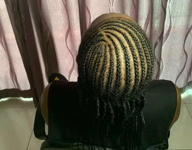 Cornrow braids with natural hair Photo: @ellabraidingservices Source: Facebook