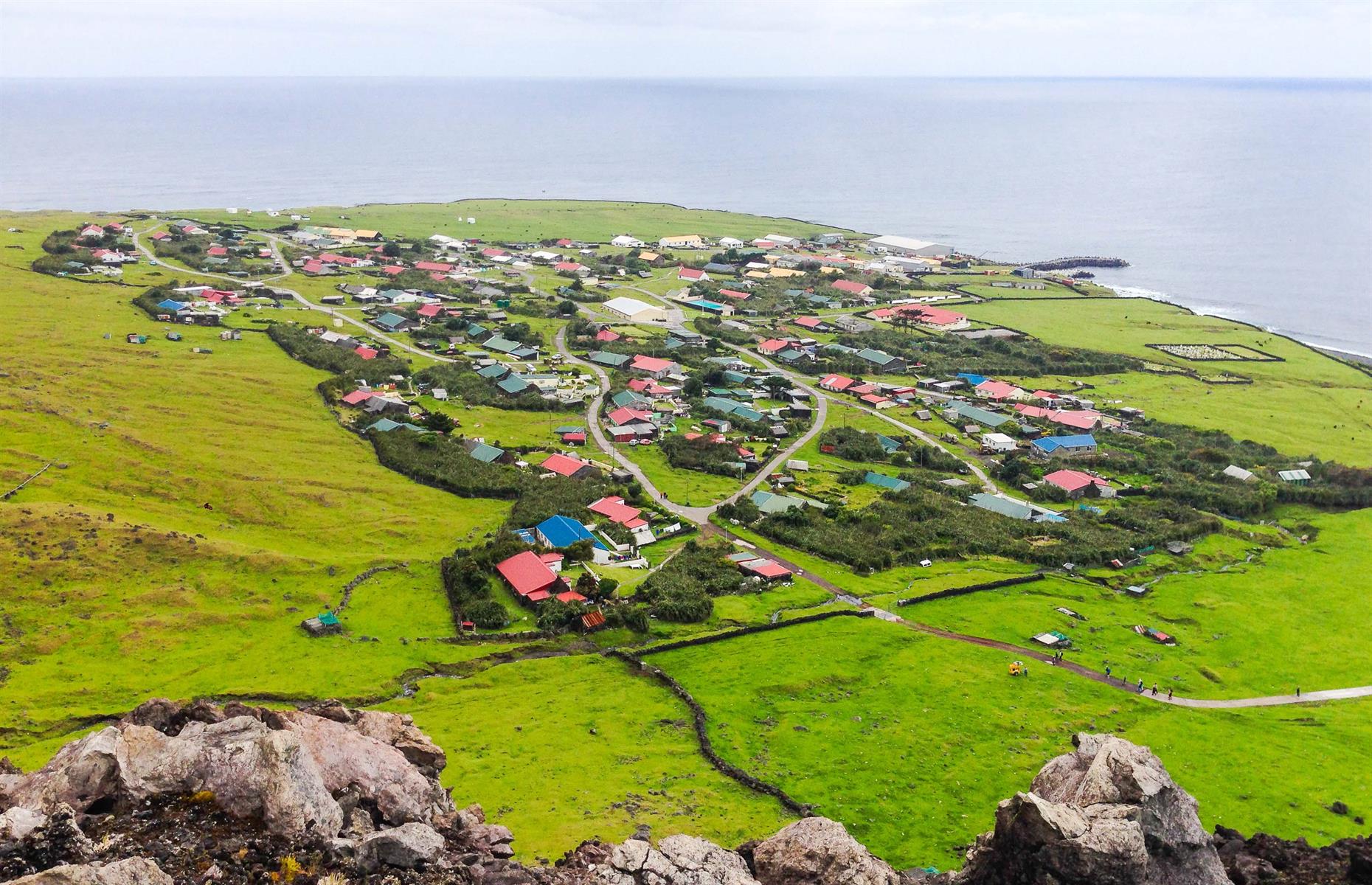 <p>The world's most remote populated island, Tristan da Cunha sits in the middle of the Atlantic Ocean. 1,750 miles from Cape Town, Edinburgh of the Seven Seas, the only settlement on the island, is home to around <a href="https://www.tristandc.com/population.php">234</a> permanent residents.</p>