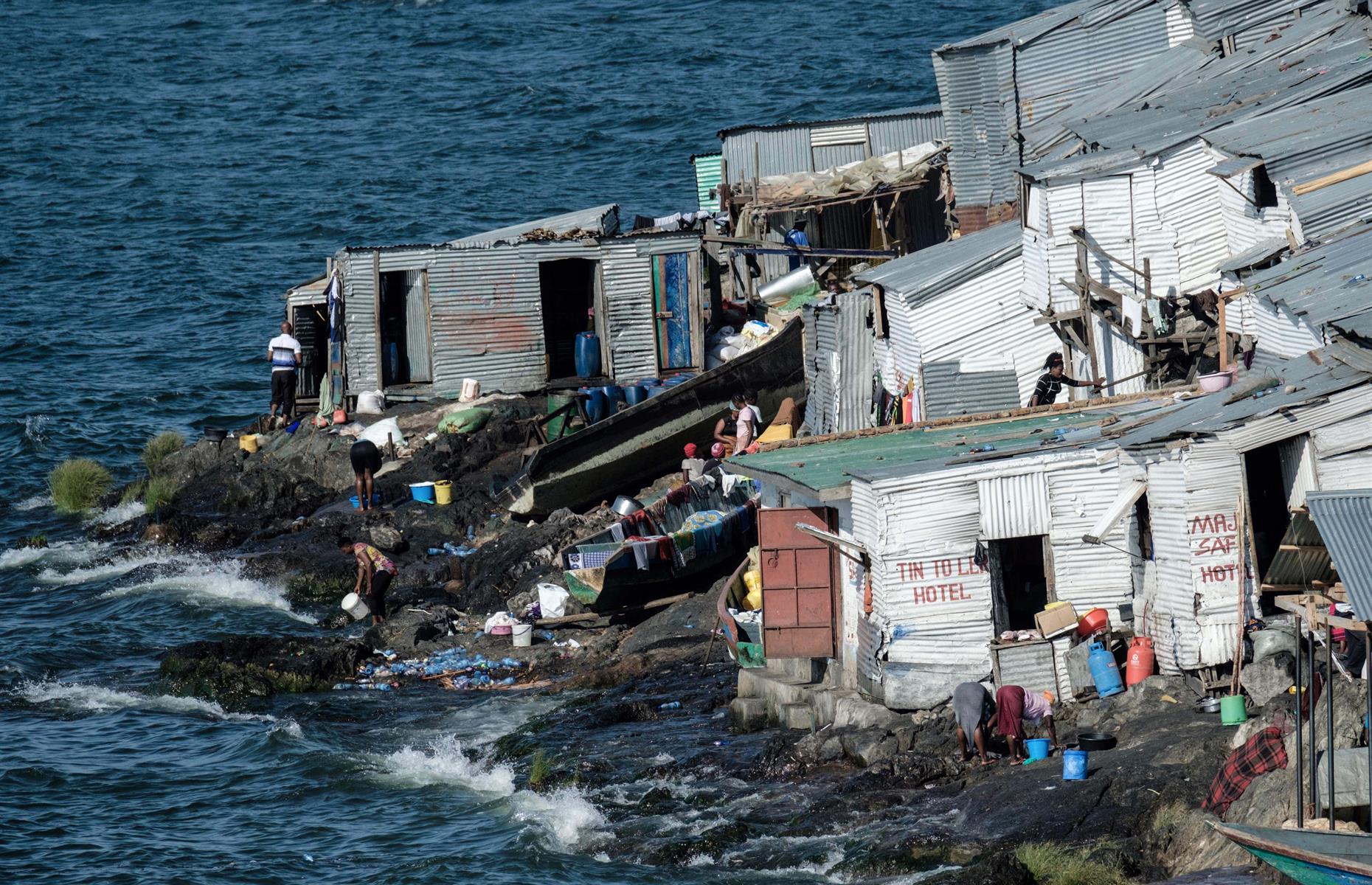 <p>Inaccessible to those without boats, the crowded island is jam-packed with houses made from recovered tin and scavenged materials.</p>