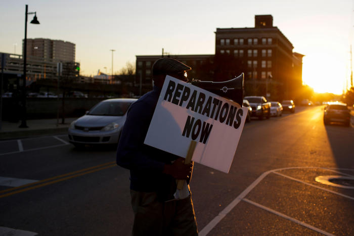 city sued for paying hundreds of black residents $25,000 in reparations