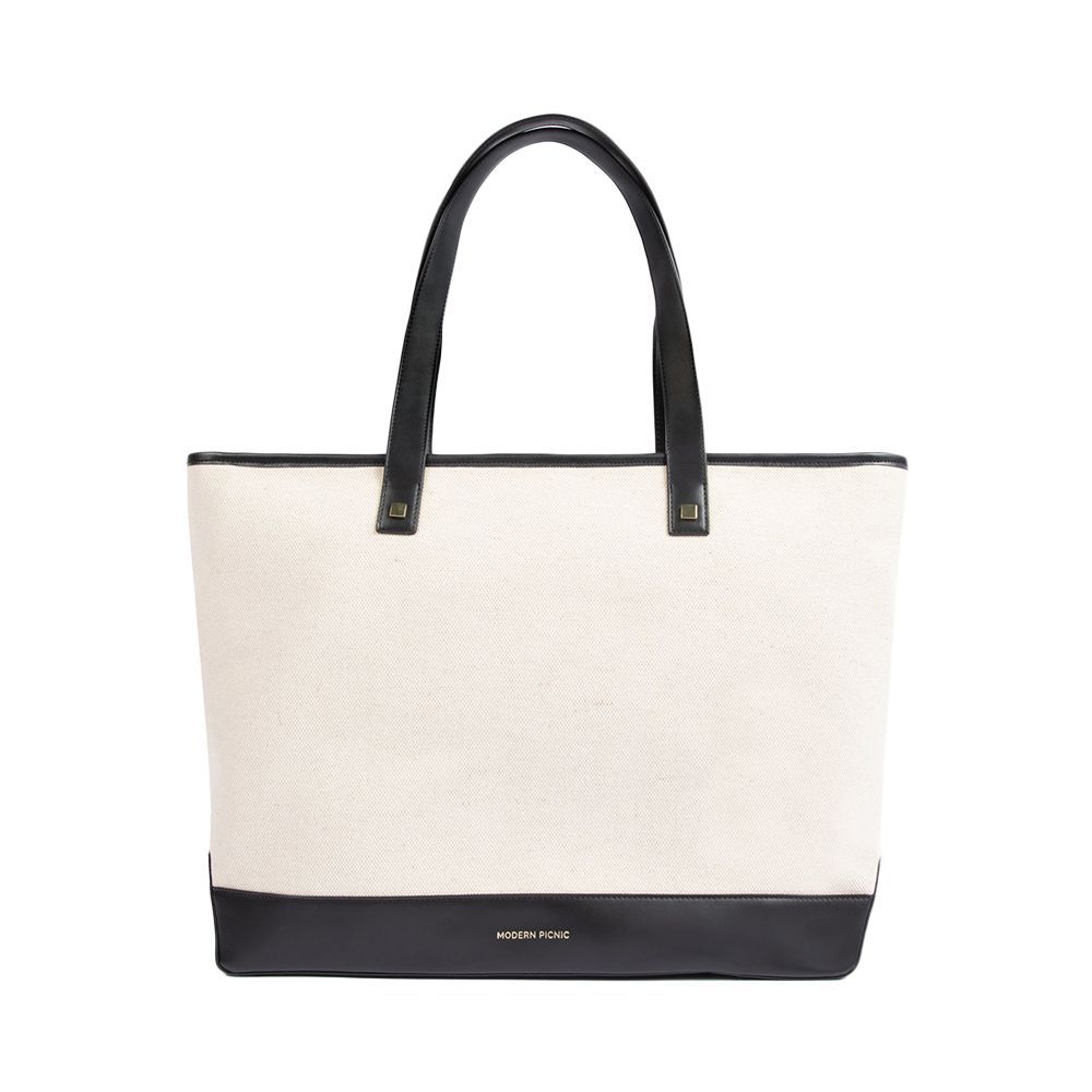 <p><strong>$250.00</strong></p><p>From the picnic to the beach hang to the plane, this spacious tote bag is great for holding all your daily essentials. (You know how we love our <a href="https://www.elle.com/fashion/shopping/g43829679/best-canvas-tote-bags/">canvas tote bags</a>.) Thanks to the removable insulated pouch, your laptop, and lunch will have a safe space to co-exist while you’re bopping around town. </p><p><strong>Dimensions: </strong>Length: 13 inches x height: 16 inches x depth: 10 inches</p><p><strong>Color: </strong>6 options</p><p><strong>Material: </strong>Vegan Leather </p>