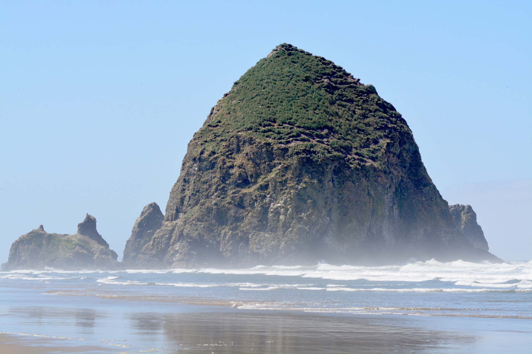 <p>California's Pacific Coastal Highway may get all the attention, but the <a href="https://www.globeguide.ca/oregon-coast-road-trip/" title="https://www.globeguide.ca/oregon-coast-road-trip/">Oregon Coast Highway 101</a> deserves equal kudos. The seven-hour coastal route snakes by or through redwood forests, wonderful beaches, including Cannon Beach (the charms of the seaside town celebrated in movies such as <em>The Goonies</em> and <em>Twilight</em>), small towns such as Seaside and Newport, state parks, and the Myrtle Tree Trail, a quarter-mile walk leading to what may be the world’s largest known eucalyptus tree, with a canopy that’s almost 70 feet across.</p>