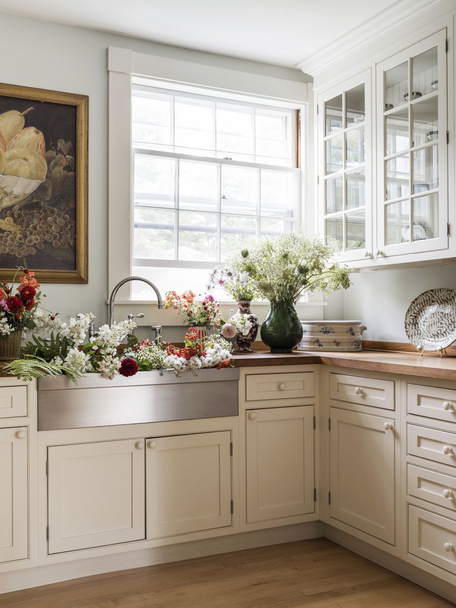 <p>Butcher-block counters and a stainless steel sink (<a href="https://www.franke.com/us/en/home.html">Franke</a>) build charming practicality into the butler’s pantry. </p>