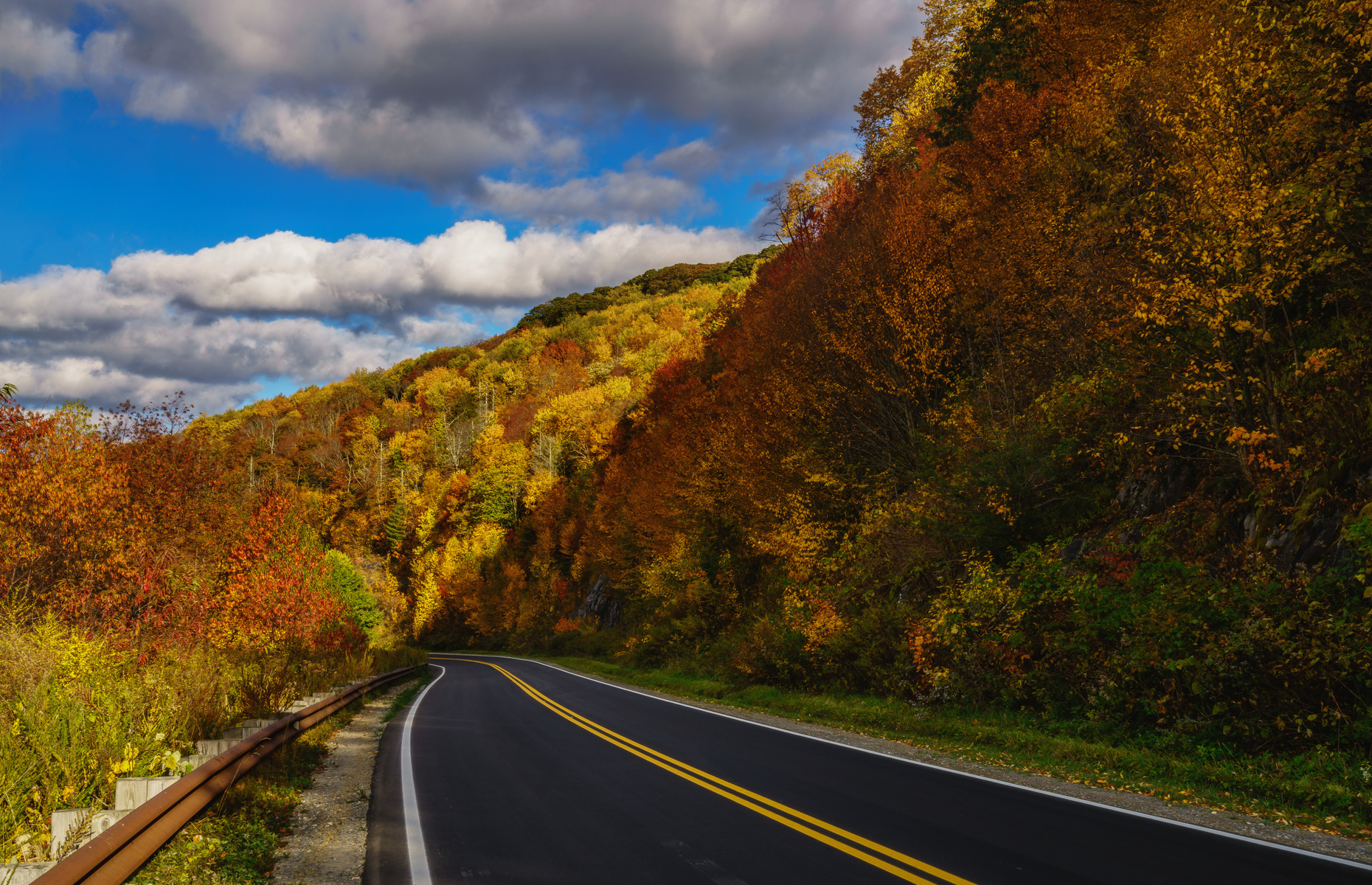 <p>Named a National Scenic Byway, the <a href="https://www.roadtripsandcoffee.com/road-trip-cherohala-skyway-tennessee-north-carolina/" title="https://www.roadtripsandcoffee.com/road-trip-cherohala-skyway-tennessee-north-carolina/">Cherohala Skyway </a>delivers an amazing scenic drive through the Appalachian Mountains of Tennessee and North Carolina. The 41-mile route ascends about 4,500 feet and winds around mountain peaks and provides scenic outlooks from a mile up. A lovely hidden waterfall, a lake beach, many mountain vistas and tons of hiking trails are among the other attractions on the skyway.</p>