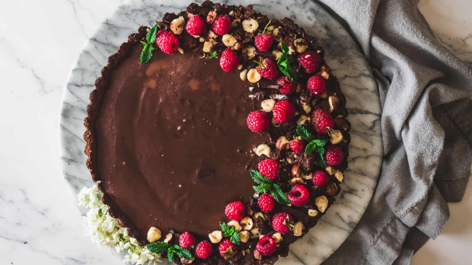 <p>Indulge in the perfect blend of rich chocolate and tangy raspberries with this elegant tart. With its smooth and decadent filling, this dessert offers a sophisticated taste while being an ideal choice for summer gatherings.<br><strong>Get the Recipe: </strong><a href="https://immigrantstable.com/chocolate-raspberry-tart/?utm_source=msn&utm_medium=page&utm_campaign=msn">Chocolate Raspberry Tart</a></p>