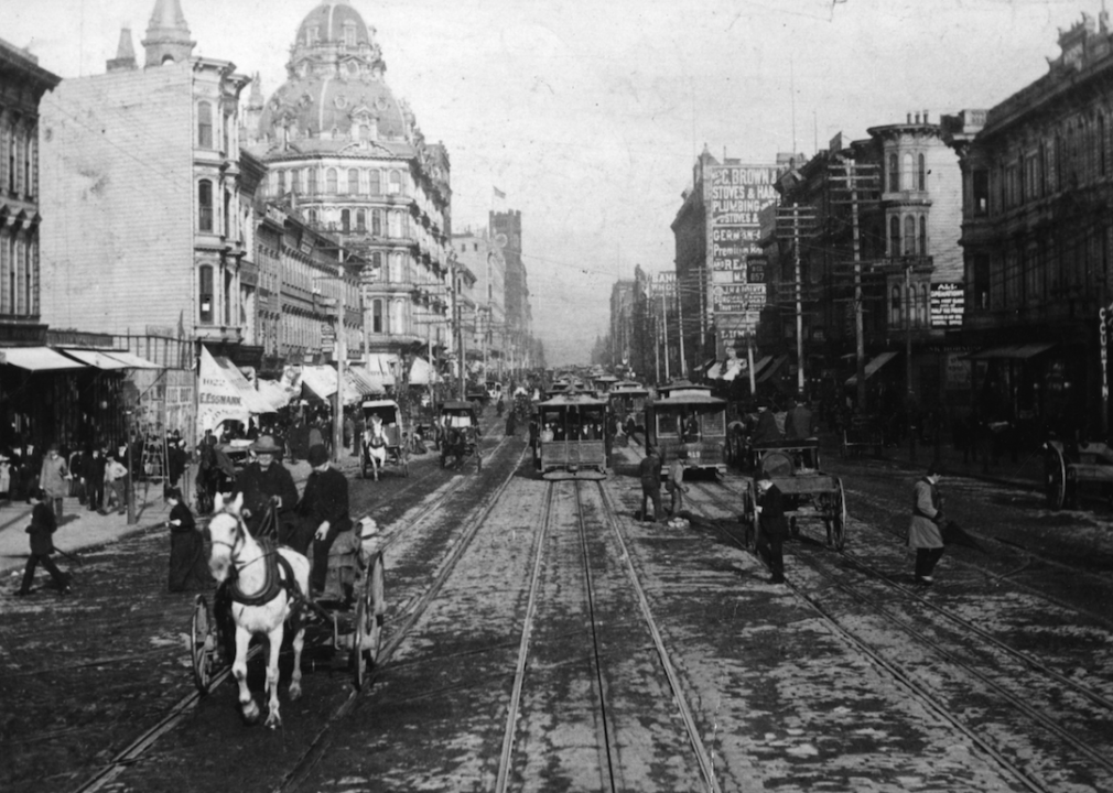 <p>Built to serve as a more efficient alternative to the horse-drawn wagons and cable cars of the time, <a href="https://sfmta.com/blog/sfs-first-electric-streetcar-line-opened-125-years-ago-today">electric streetcars</a> emerged as a mode of San Francisco transportation in 1892. This photo shows a section of the streetcar line along Market Street, which was the origin of the line that then ran through the Mission District and Glen Park to end in the Colma cemeteries.</p>
