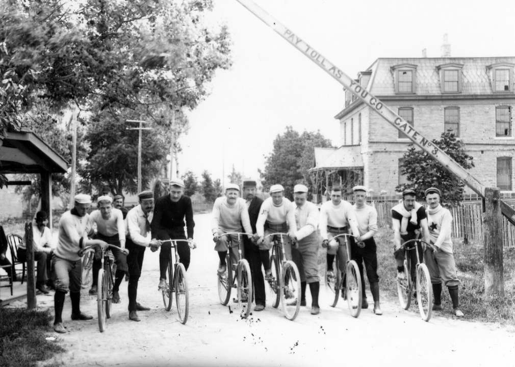 <p>Before Americans had many transportation options beyond horse-drawn wagons and coaches, cycling became a simple and popular way for people to get around. The convenience and rising ubiquity of cycling paved the way for the creation of <a href="https://cityroom.blogs.nytimes.com/2010/01/19/the-bittersweet-history-of-bike-clubs/">bicycle clubs</a> across the country, where like-minded residents of a community formed an organization focused on bicycle-forward travel, exploration, and enjoyment. This photograph from 1892 shows members of the Cincinnati-based Brighton Bicycle Club as they prepare to race.</p>