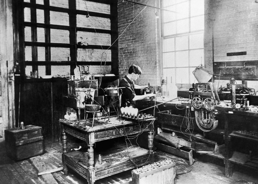 <p>Though Thomas Edison is most commonly remembered for his invention of the incandescent lightbulb, the prolific inventor's work extends far beyond that, with a record 1,093 patents to his name. In this photograph, a young Edison works in his New Jersey laboratory. Edison perfected his lightbulb in 1879 after more than a year of tinkering and testing.</p>