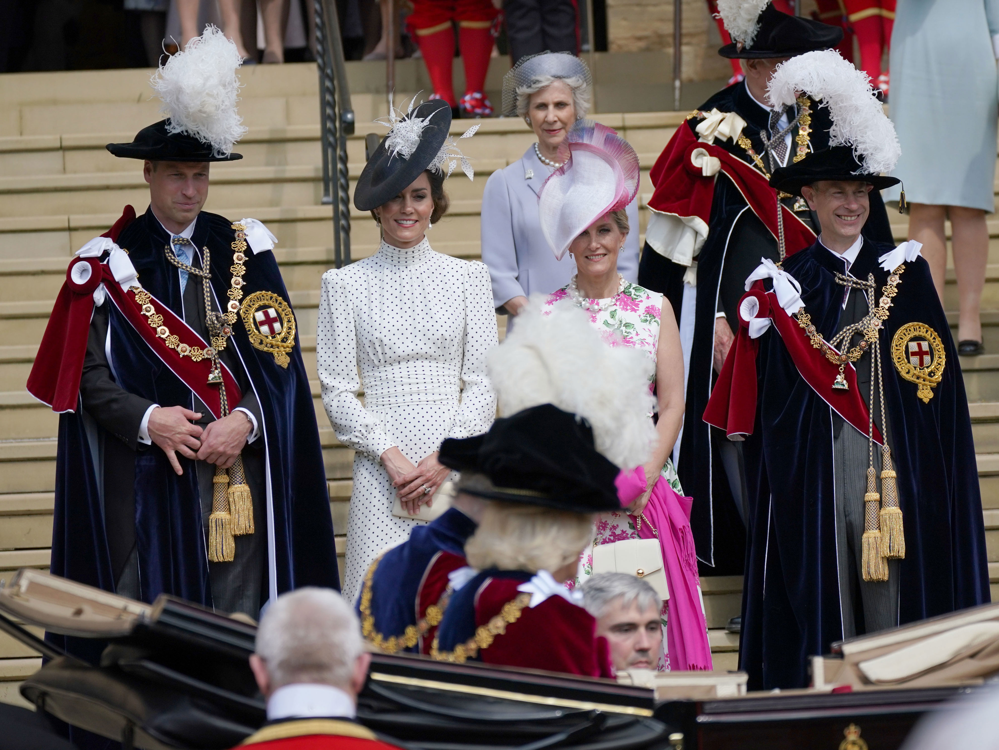 <p>Prince William and wife Princess Kate and Sophie, Duchess of Edinburgh and husband Prince Edward watched as King Charles III and Queen Camilla departed after the Order of the Garter Service at Windsor Castle in Windsor, England, on June 19, 2023. The Order of the Garter is the oldest and most senior order of chivalry in Britain. Knights of the Garter are chosen personally by the sovereign to honor those who have held public office, contributed in a particular way to national life or who have served the sovereign personally.</p>