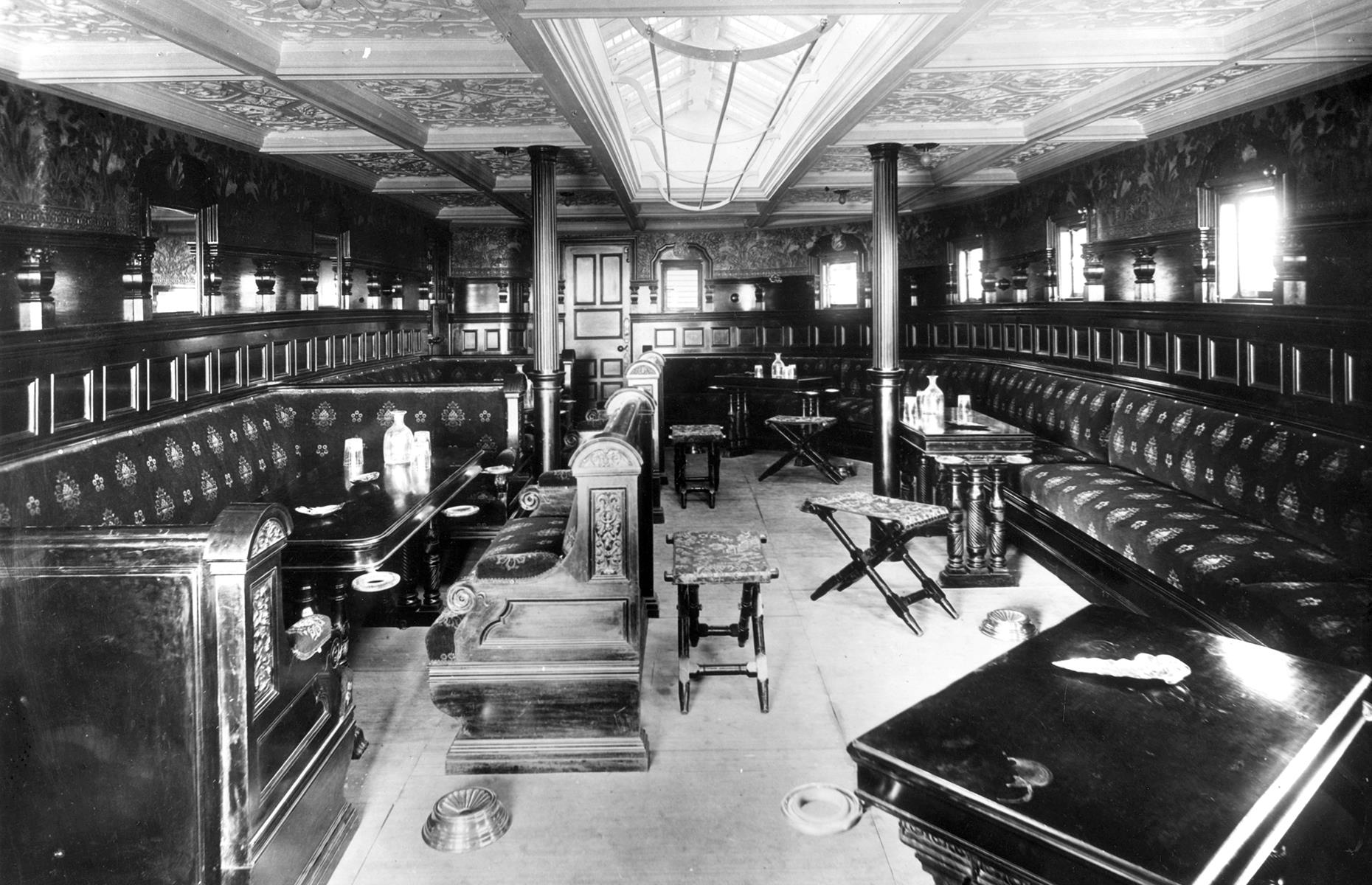 By the end of the 19th century, passenger cruise ships had become an exercise in luxury, with Cunard tipping its liners as "floating palaces". Offerings from competitors like P&O were just as lavish: this 1892 snap shows an opulent smoking room on P&O's Himalaya ship. Notice the plush booths, dark carved wood and intricate ceiling reliefs.