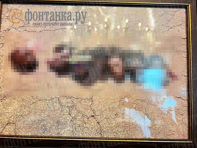 A framed photo which is purported to be of the severed heads of exiled private military leader Prigozhin's enemies
