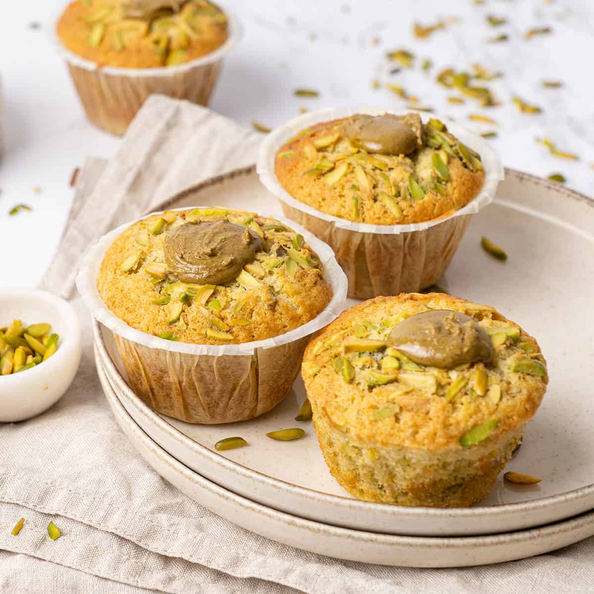 <p>If you like pistachios, you will love these delicious bakery-style <a href="https://www.spatuladesserts.com/pistachio-muffins/">pistachio muffins</a>! This easy muffin recipe uses 100% natural ingredients and combines oil and butter to make the most flavorful, moist, and fluffy muffins, they are then topped with homemade pistachio butter. Pistachio muffins without pudding or artificial flavors and color!</p> <p><strong>Go to the recipe: <a href="https://www.spatuladesserts.com/pistachio-muffins/">Pistachio Muffins</a></strong></p>