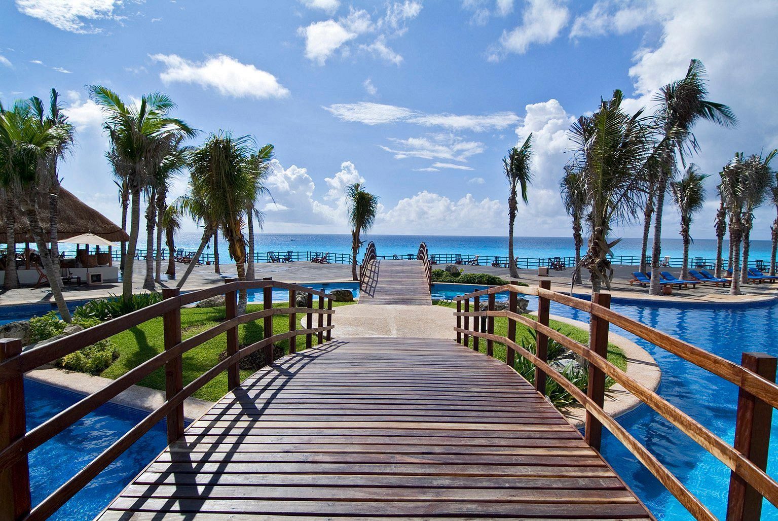 <h3>Grand Oasis Cancún, Mexico</h3> <p>The <a href="https://www.tripadvisor.com/Hotel_Review-g150807-d154444-Reviews-Grand_Oasis_Cancun-Cancun_Yucatan_Peninsula.html" rel="noopener noreferrer">Grand Oasis Cancún</a> is party central in the heart of Cancún's all-inclusive haven, the Hotel Zone. It takes its cue from <a href="https://www.rd.com/list/las-vegas-attractions/" rel="noopener noreferrer">Las Vegas</a> but adds plenty of Mexican spice for something really special. Bungee, tightropes, beach soccer and water slides also make fellow guests part of the entertainment.</p> <p>At the open-air bar Zocalo, a DJ spins three times a week, and a live band and Mexican or Caribbean celebrations take place the other four. Multiple other venues take the spotlight once the sun sets: the Oasis Arena features concerts by international artists—and is known to host a boxing championship or two. Fire and drum shows take place at the Atrium theater, but for something more risqué, the Kinky Night Club, featuring burlesque, live music and sketch acts, draws in revelers. Then there's the 24-hour casino, plus 13 restaurants to choose from. Or go for the extra-cost sensory gastronomy and specialty restaurant experiences if your favorite performance art is culinary.</p> <p><strong>Pros:</strong></p> <ul> <li>Nonstop schedule of events for those who like to stay busy</li> <li>Adults-only spaces, evening venues and entertainment</li> </ul> <p><strong>Cons:</strong></p> <ul> <li>Can be loud and overstimulating</li> <li>Several restaurants require additional cost</li> </ul> <p class="listicle-page__cta-button-shop"><a class="shop-btn" href="https://www.tripadvisor.com/Hotel_Review-g150807-d154444-Reviews-Grand_Oasis_Cancun-Cancun_Yucatan_Peninsula.html">Book Now</a></p>