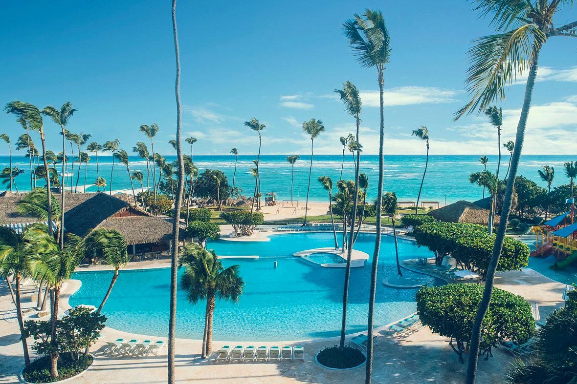 <h3>Iberostar Selection Bavaro Suites, Dominican Republic</h3> <p>If space is what you seek, look no further than the <a href="https://www.tripadvisor.com/Hotel_Review-g3176298-d150841-Reviews-Iberostar_Selection_Bavaro_Suites-Bavaro_Punta_Cana_La_Altagracia_Province_Dominican_R.html" rel="noopener noreferrer">Iberostar Selection Bavaro Suites</a> in the <a href="https://www.rd.com/list/all-inclusive-resorts-caribbean/" rel="noopener noreferrer">Caribbean</a>. The property has its own Caribbean town, and the amenities are vast. Located on a Blue Flag beach in the Dominican Republic—which means the beach meets stringent environmental and safety criteria—the resort features a three-story fitness center, a golf course and eight dining options supplemented with eateries from two adjacent sister resorts.</p> <p>This affordable all-inclusive resort allows you to book junior suites that connect or large family suites. Within those, there are sunken seating areas with convertible sleep spaces should you choose to keep the crew in just one room. You can ask for PlayStations when the sun's just too much, despite the plentiful pools. Kids can experience activities like an on-site coral nursery or participate in Star Camp, which is broken out into three age groups between 4 and 17.</p> <p><strong>Pros:</strong></p> <ul> <li>Wide selection of connecting suites and family suites</li> <li>Use of multiple property amenities within the complex</li> <li>Emphasis on environmental sustainability</li> </ul> <p><strong>Cons:</strong></p> <ul> <li>Large property can be confusing to get around</li> <li>Kids club not available for children under age 4</li> </ul> <p class="listicle-page__cta-button-shop"><a class="shop-btn" href="https://www.tripadvisor.com/Hotel_Review-g3176298-d150841-Reviews-Iberostar_Selection_Bavaro_Suites-Bavaro_Punta_Cana_La_Altagracia_Province_Dominican_R.html">Book Now</a></p>