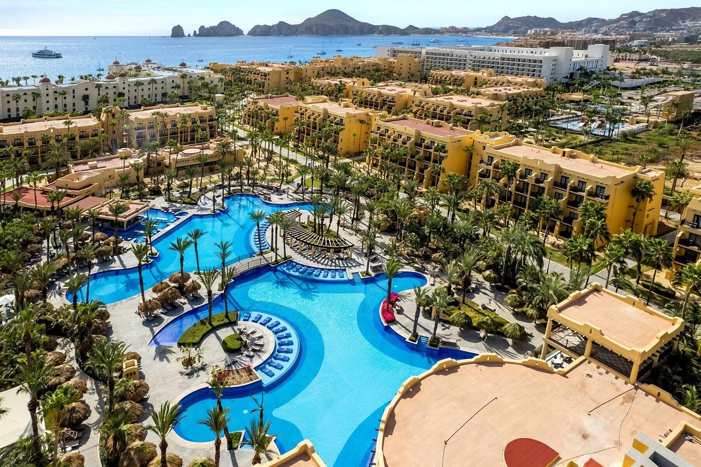 <h3>Hotel Riu Santa Fe, Mexico</h3> <p>Whether you're looking for a cheap all-inclusive resort for a bachelor or bachelorette party, birthday party or any kind of friends' trip at all, <a href="https://www.tripadvisor.com/Hotel_Review-g152515-d672603-Reviews-Hotel_Riu_Santa_Fe-Cabo_San_Lucas_Los_Cabos_Baja_California.html" rel="noopener noreferrer">Riu Santa Fe</a> in Los Cabos is a recently renovated and highly happening resort in Mexico that's perfect for groups. With room setups that include supersized king beds, twin extra-long beds and two double beds, plus by-request adjoining rooms for in-person wake-up calls and an enormous inventory of accommodations, there's a configuration for every kind of friend group.</p> <p>The hotel offers party-atmosphere events that vary by day ... or night. During the daylight hours, expect jungle- and pink-themed parties at the adults-only pool, and if that's not your idea of a good time, there are nine different pools to splash in on this property. Twice weekly, a DJ spins as live entertainers perform. What's more, it's one of the few Hotel Riu properties that allow <a href="https://www.rd.com/list/tripadvisor-spring-break-experiences/">spring breakers</a> if you're really looking to let loose.</p> <p><strong>Pros:</strong></p> <ul> <li>Room setups that easily accommodate friend groups</li> <li>Adults-only pool parties</li> <li>On-site water park open six days a week</li> </ul> <p><strong>Cons:</strong></p> <ul> <li>Like many Los Cabos beaches, this one is not swimmable</li> <li>With 1,200 rooms, this is a very large property to navigate</li> </ul> <p class="listicle-page__cta-button-shop"><a class="shop-btn" href="https://www.tripadvisor.com/Hotel_Review-g152515-d672603-Reviews-Hotel_Riu_Santa_Fe-Cabo_San_Lucas_Los_Cabos_Baja_California.html">Book Now</a></p>