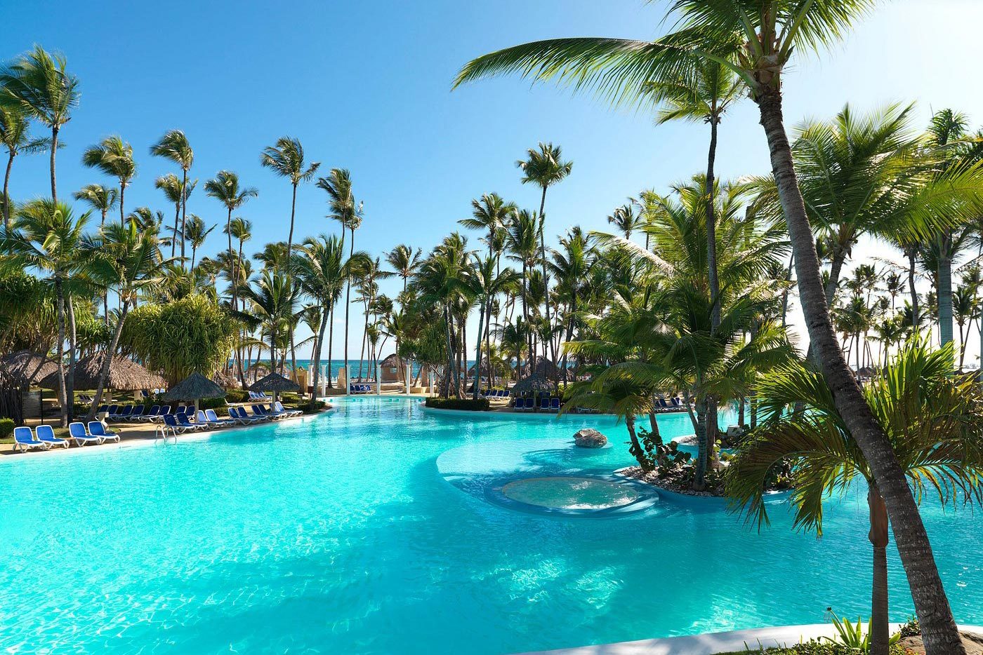 <h3>Meliá Caribe Beach Resort, Dominican Republic</h3> <p>For those who find "free golf" the best value for their green, it's hard to overlook the <a href="https://www.tripadvisor.com/Hotel_Review-g3176298-d14815741-Reviews-Melia_Caribe_Beach_Resort-Bavaro_Punta_Cana_La_Altagracia_Province_Dominican_Republi.html" rel="noopener noreferrer">Melia Caribe Beach Resort</a>, one of the best affordable all-inclusive resorts in Punta Cana, which offers complimentary rounds with some stays—especially when it's designed by six-time Spanish champ Jose "Pepe" Gancedo. The three nine-hole courses are interspersed with coconut trees and beautiful lakes.</p> <p>The resort's interiors are classically colonial with a timeless cream and dark wood scheme. All of these are steps from a prime location on Bavaro Beach—a short meander away, past 13 restaurants and through tropical gardens. There's also the Splash Island Water Park, where the kids can play in the water as you do the same on the green. For even more to do, this resort offers a complimentary shuttle to the theme park Katmandu Park and sells tickets to the attraction right on site.</p> <p><strong>Pros:</strong></p> <ul> <li>Golf is listed among the resort's inclusions for select stays</li> <li>Wide selection of restaurants</li> <li>Complimentary shuttle to Katmandu Park</li> </ul> <p><strong>Cons:</strong></p> <ul> <li>Golf cart rental not included</li> <li>Need to rent golf clubs at an additional cost or pack your own</li> </ul> <p class="listicle-page__cta-button-shop"><a class="shop-btn" href="https://www.tripadvisor.com/Hotel_Review-g3176298-d14815741-Reviews-Melia_Caribe_Beach_Resort-Bavaro_Punta_Cana_La_Altagracia_Province_Dominican_Republi.html">Book Now</a></p>