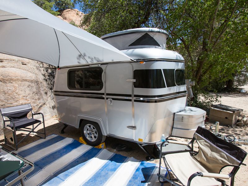 <p>Travel trailers are <a href="https://blog.cheapism.com/rv-alternatives/">cheaper and smaller than</a> other RVs. A used trailer that can accommodate two people (albeit snugly) can be had for $10,000 or less. While the trailer will spare your budget, you'll still need a vehicle that's powerful enough to tow it, such as a crossover, SUV, or truck. If you choose to go with a motorhome, you'll need secondary transportation as well, unless you want to drive your RV everywhere (including on mundane errands, which no one recommends doing). That could mean towing a car behind an RV, in which case you’ll also need to invest in a towing rig, or commit to bicycling or walking everywhere when you’re camping.</p><p><b>For more great RV articles, lifestyle stories, and money-saving tips,</b> <a href="https://cheapism.us14.list-manage.com/subscribe?u=de966e79b38e1d833d5781074&id=c14db36dd0">please sign up for Cheapism's free newsletters</a>.</p>