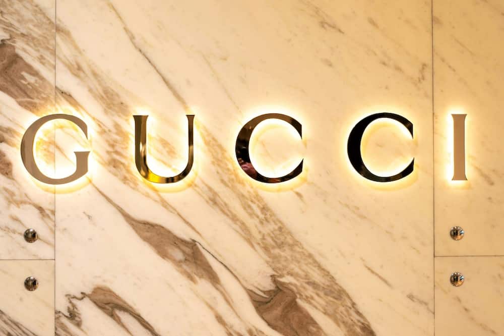 gucci design studio strikes over move to milan