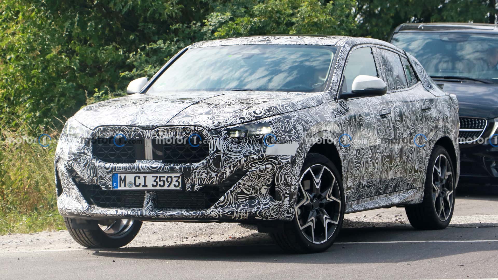 2024 BMW X2 Spied In Base Trim Showing More Of Its Nose