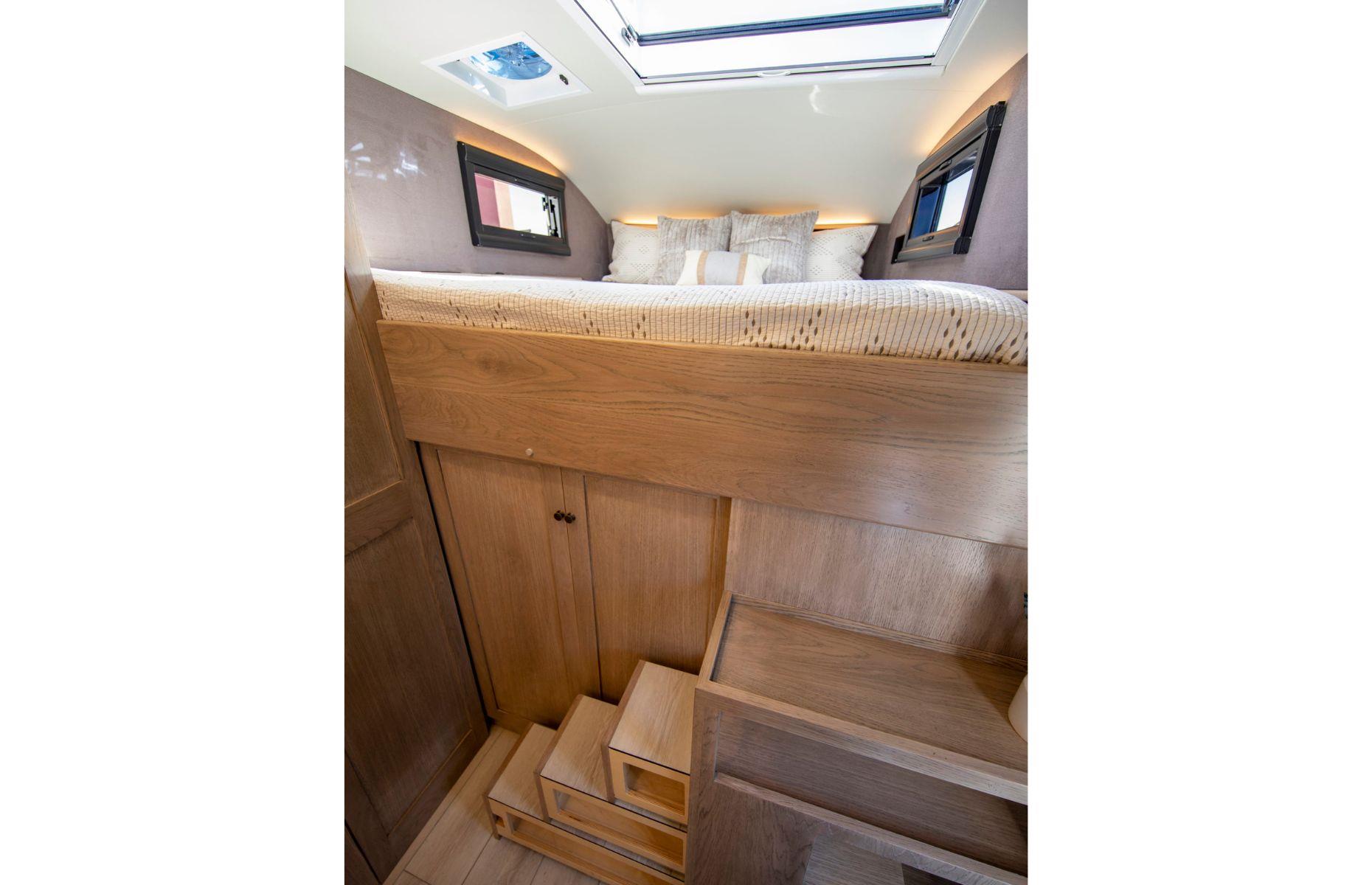 <p>Capable of accommodating up to six people, the motorhome offers a cozy king-sized master bedroom, complete with its own stylish ensuite, while the main dining area can be converted to offer additional accommodation. Fitted out with two TVs and air conditioning, the RV doesn't scrimp on comfort.</p>