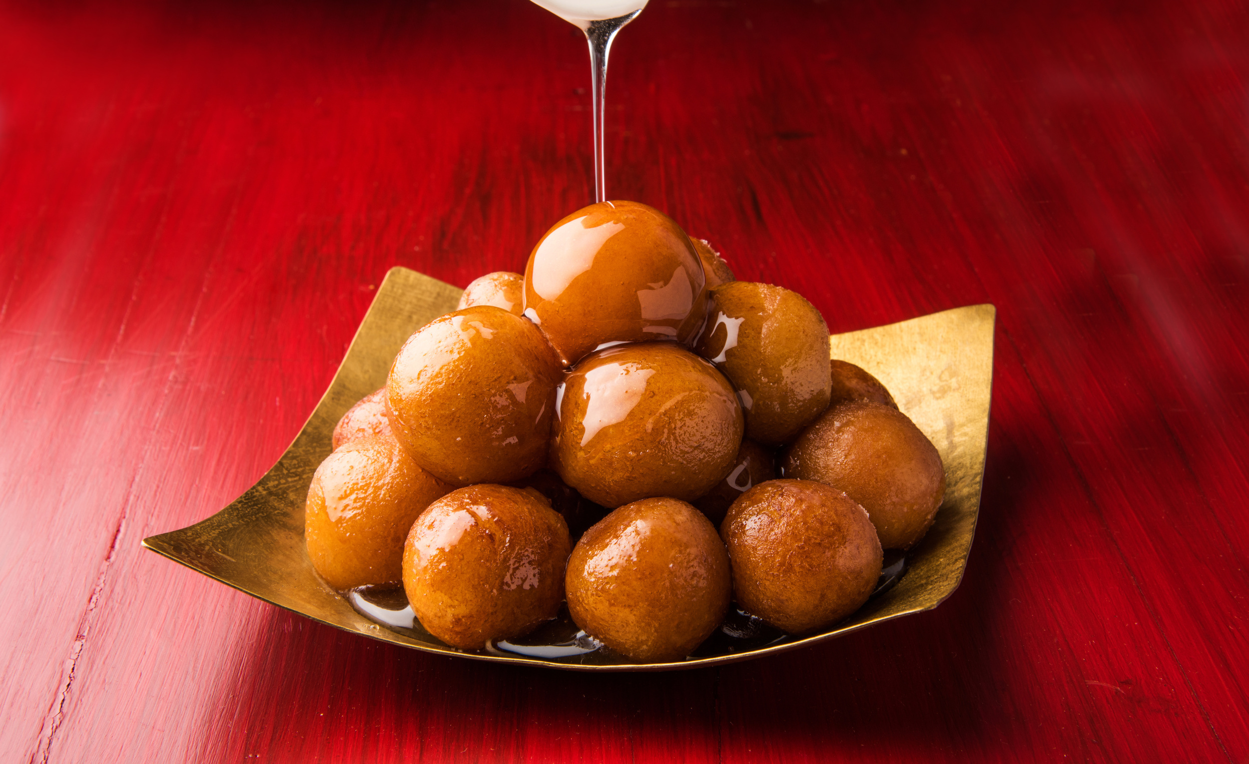 <p>A popular dessert in South Asian culture, <em>gulab jamun</em> (“rose water berry”) involves reducing milk down to a soft dough, but many chefs opt to instead use milk powder, as the reduction process can be tedious and time-consuming. After the dough balls are formed, they are fried in oil or ghee and covered in a sweet sugar syrup that makes them irresistible. <a href="https://hebbarskitchen.com/milk-powder-gulab-jamun-recipe/"><span>Get the details from Hebbars Kitchen</span></a>.</p><p><a href='https://www.msn.com/en-us/community/channel/vid-cj9pqbr0vn9in2b6ddcd8sfgpfq6x6utp44fssrv6mc2gtybw0us'>Follow us on MSN to see more of our exclusive lifestyle content.</a></p>