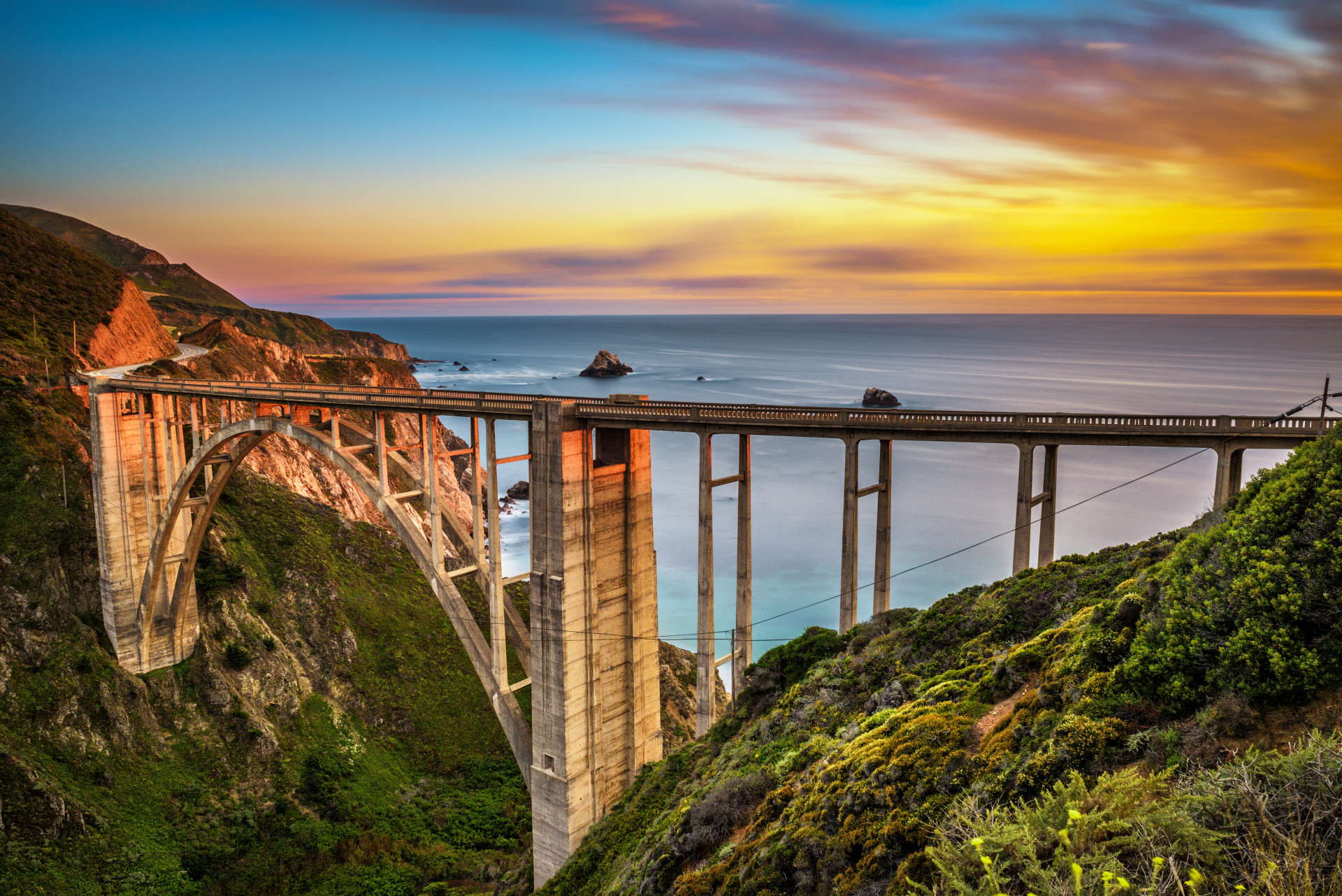 Going through Big Sur, you can stop at the Bixby Bridge for the perfect photo op.<p><a href="https://www.msn.com/en-us/community/channel/vid-7xx8mnucu55yw63we9va2gwr7uihbxwc68fxqp25x6tg4ftibpra?cvid=94631541bc0f4f89bfd59158d696ad7e">Follow us and access great exclusive content every day</a></p>