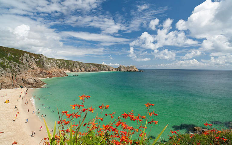 Visiting Porthcurno's cliffs and other secluded coves offers some of the best beaches in Cornwall - GETTY