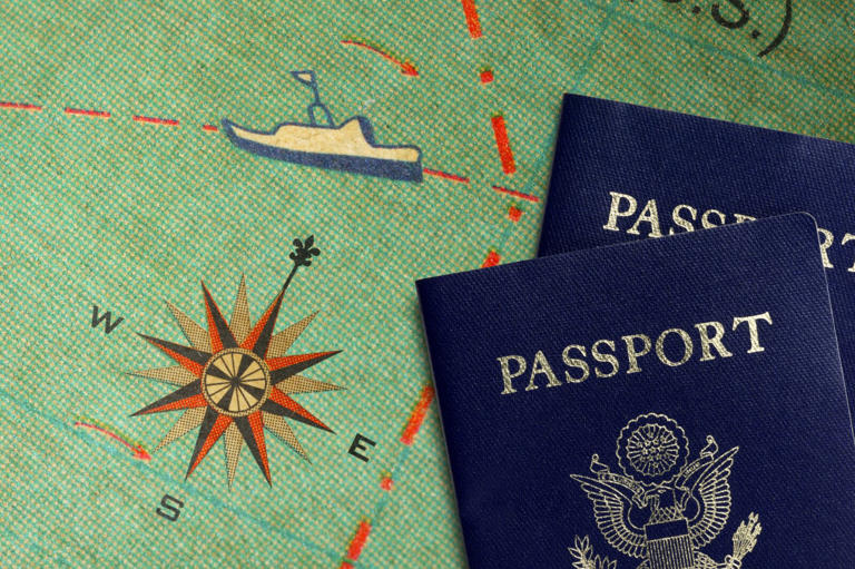 Passports on a map showing cruise lanes.