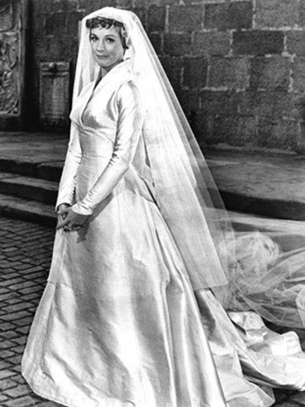 <p>This 1965 musical classic is great for many reasons, not the least of which is Maria’s (Julie Andrew) classically modest and sophisticated wedding dress. </p>