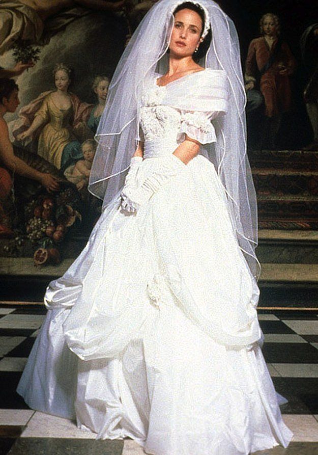 <p>I honestly gasp at this pic of Andie MacDowell (who plays Carrie) every single time—that veil, those gloves, the neckline! It’s all so good. </p>