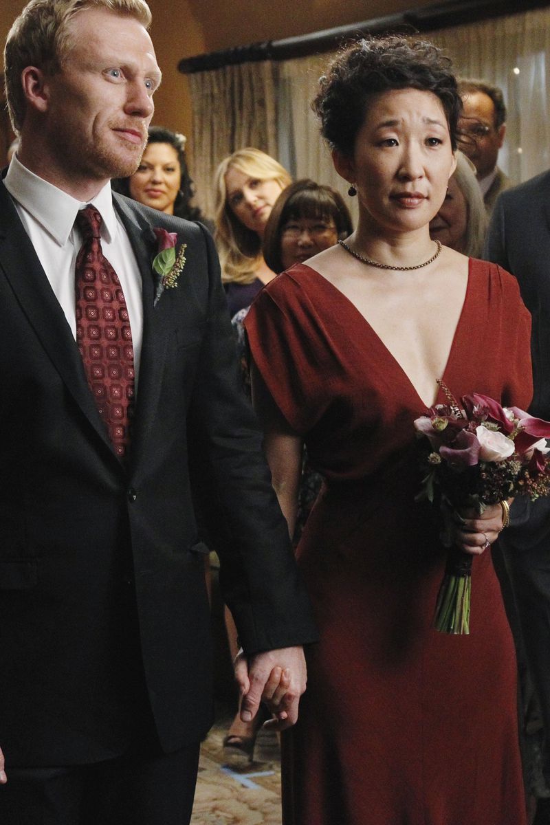 <p><em>Grey’s Anatomy</em>’s Cristina Yang wore a crimson dress and carried a color-coordinated bouquet for her season 7 wedding. </p>